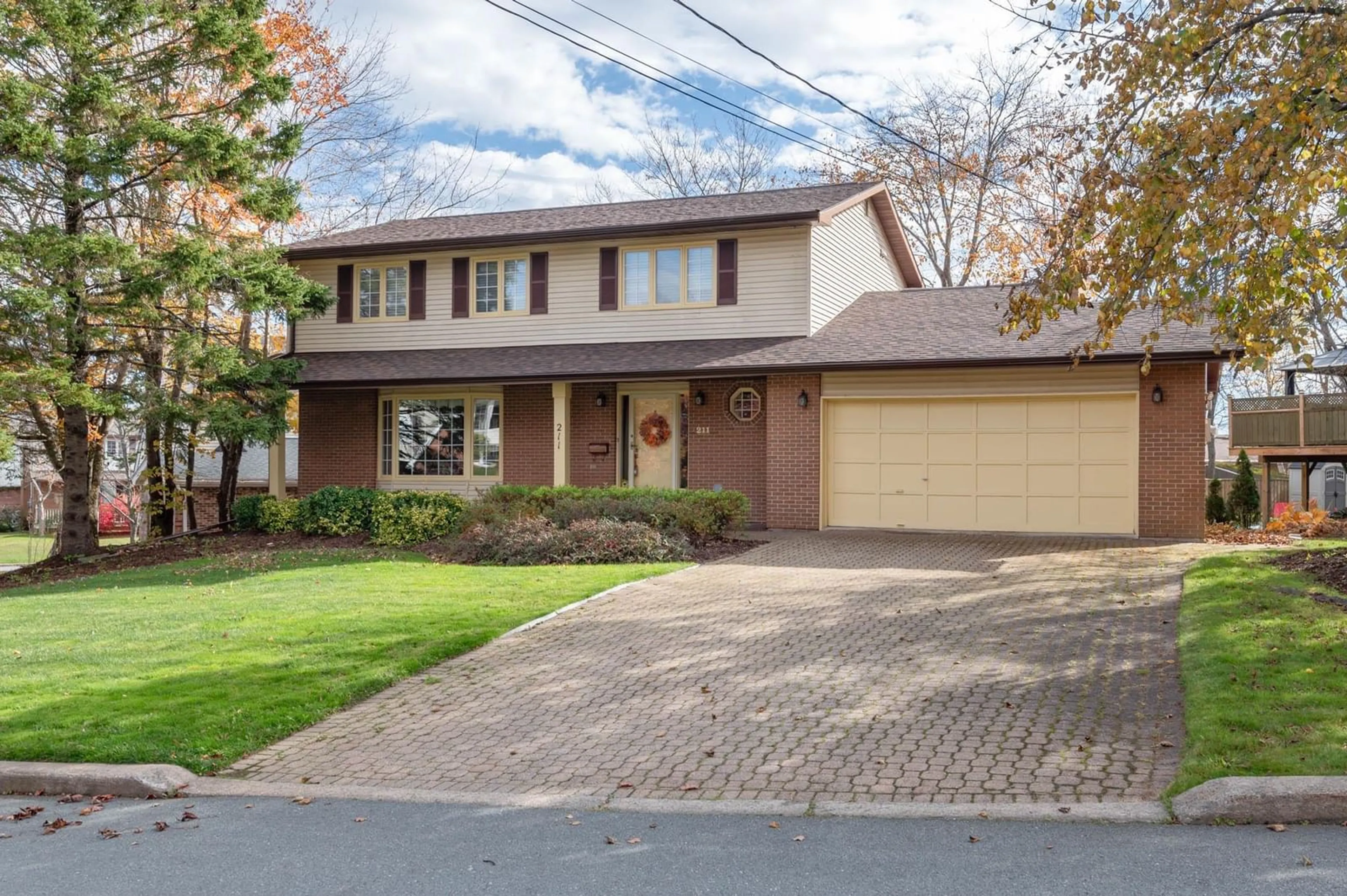 Frontside or backside of a home, the street view for 211 Flagstone Dr, Cole Harbour Nova Scotia B2V 1Z7