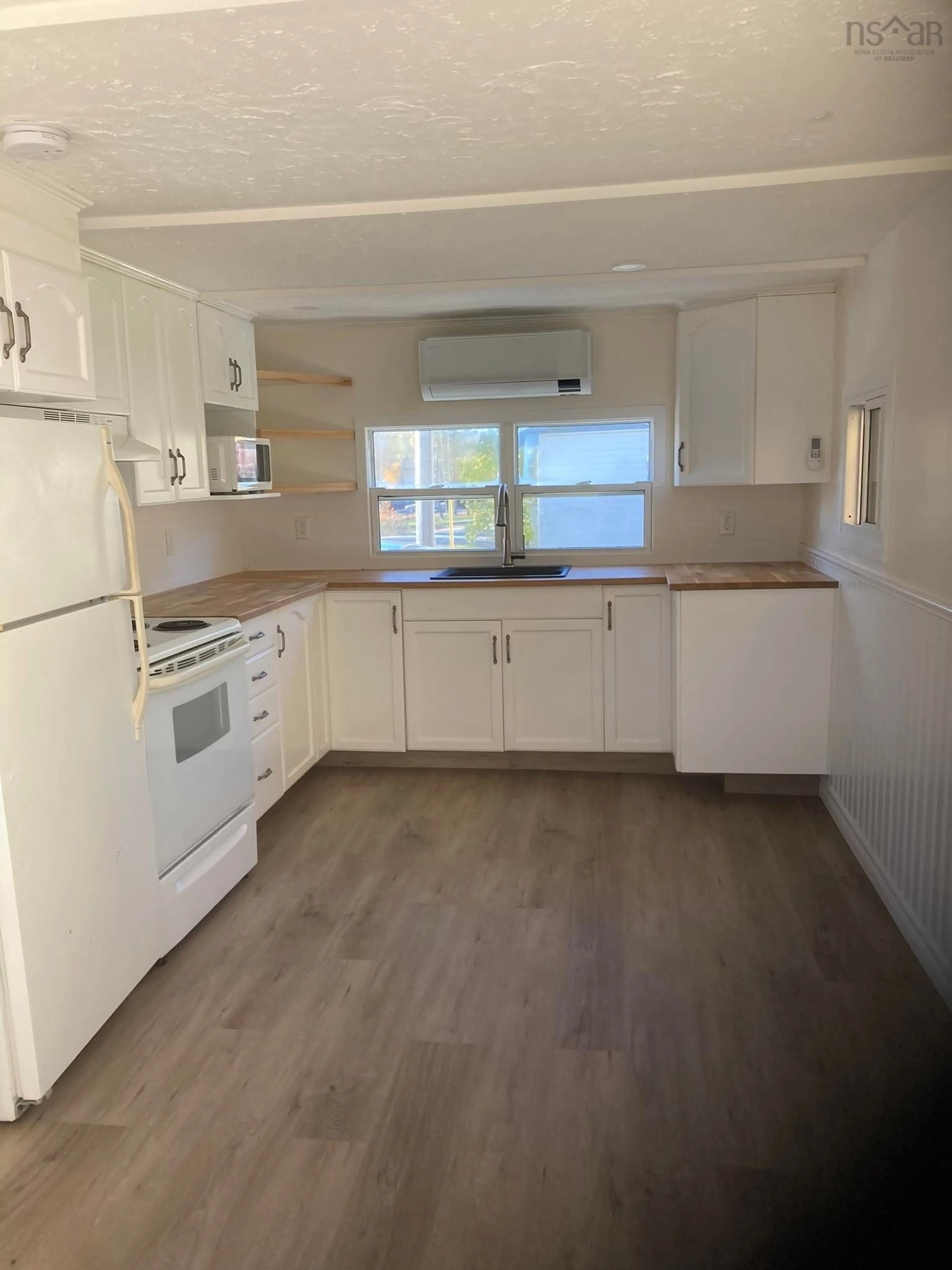 Standard kitchen, wood floors, cottage for 21 School St, Falmouth Nova Scotia B0P 1P0