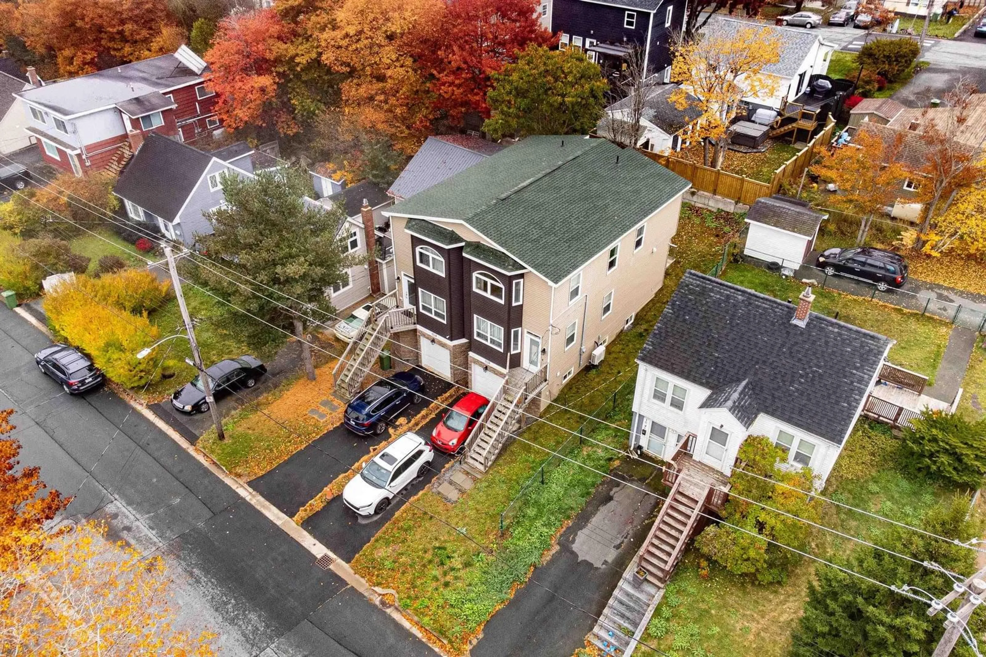 A pic from exterior of the house or condo, the fenced backyard for 102 B Rufus Ave, Fairview Nova Scotia B3N 2L9