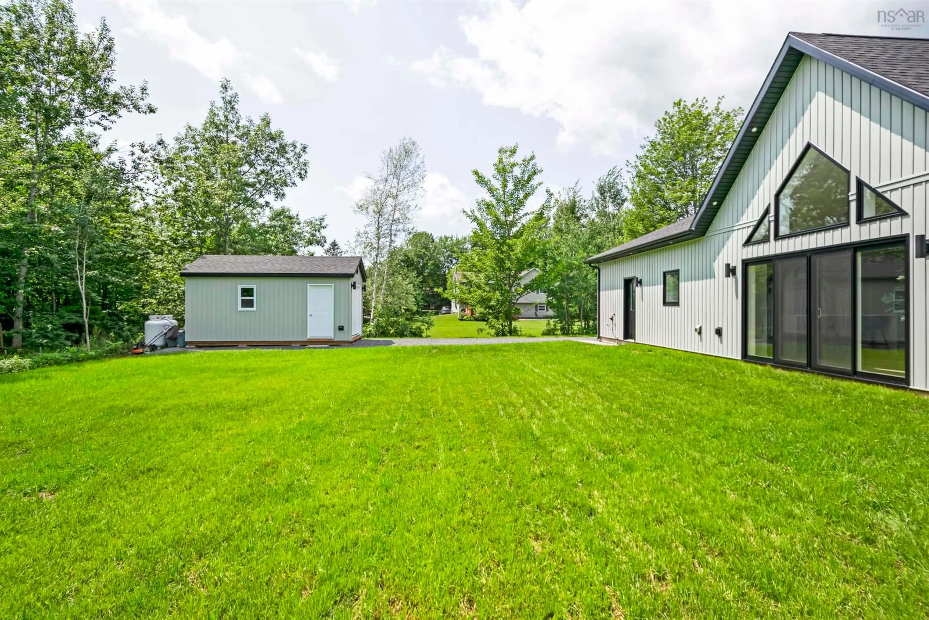 Patio, the fenced backyard for 32 Maple Cres, Mount William Nova Scotia B2H 5C6