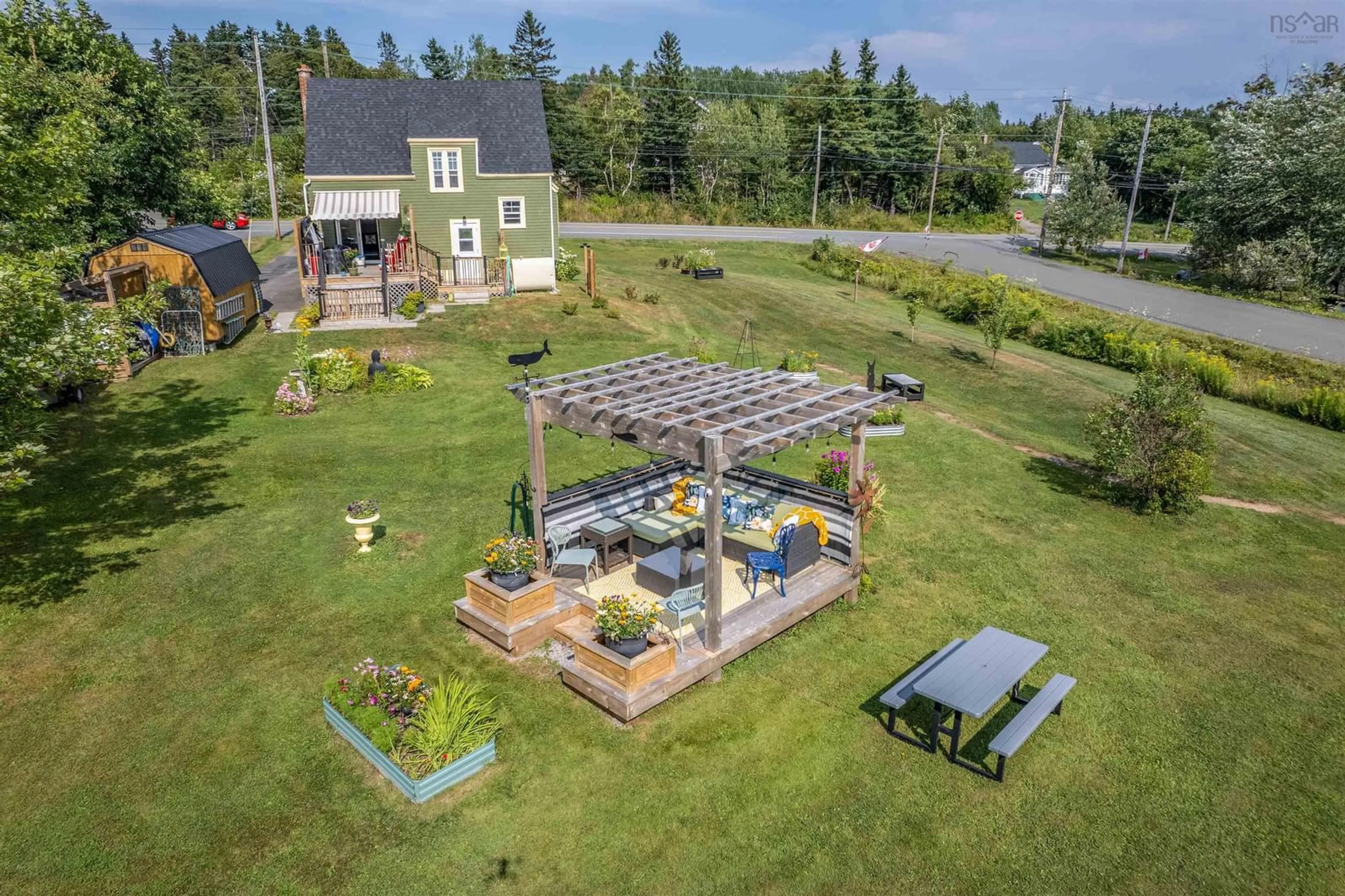 Patio, the fenced backyard for 2021 Highway 28, South Bar Nova Scotia B1N 3H8