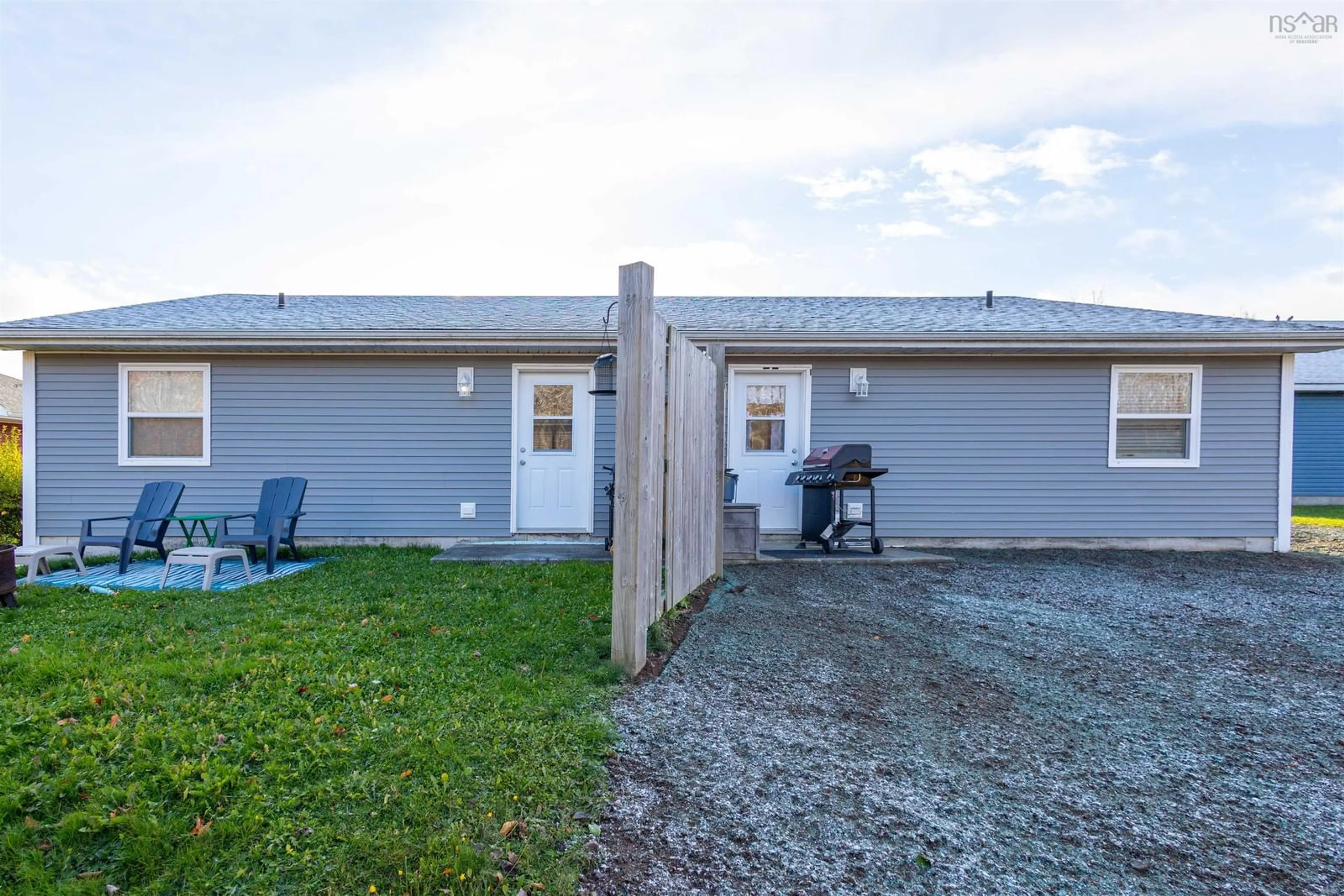 Frontside or backside of a home, the fenced backyard for 149 Patnic Ave, Sydney Nova Scotia B1P 3G6