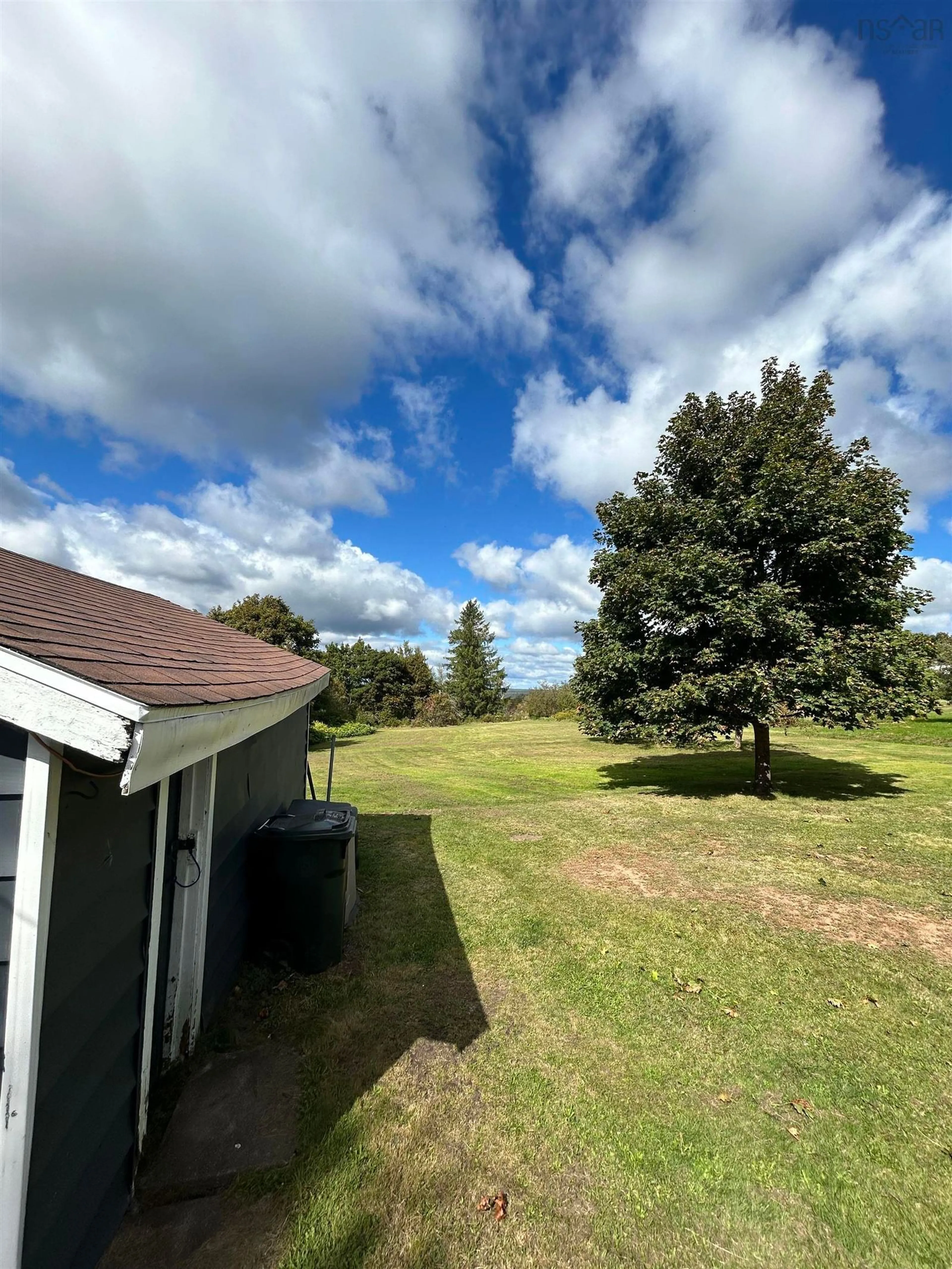 Frontside or backside of a home, the fenced backyard for 6 Maple St, Springhill Nova Scotia B0M 1X0