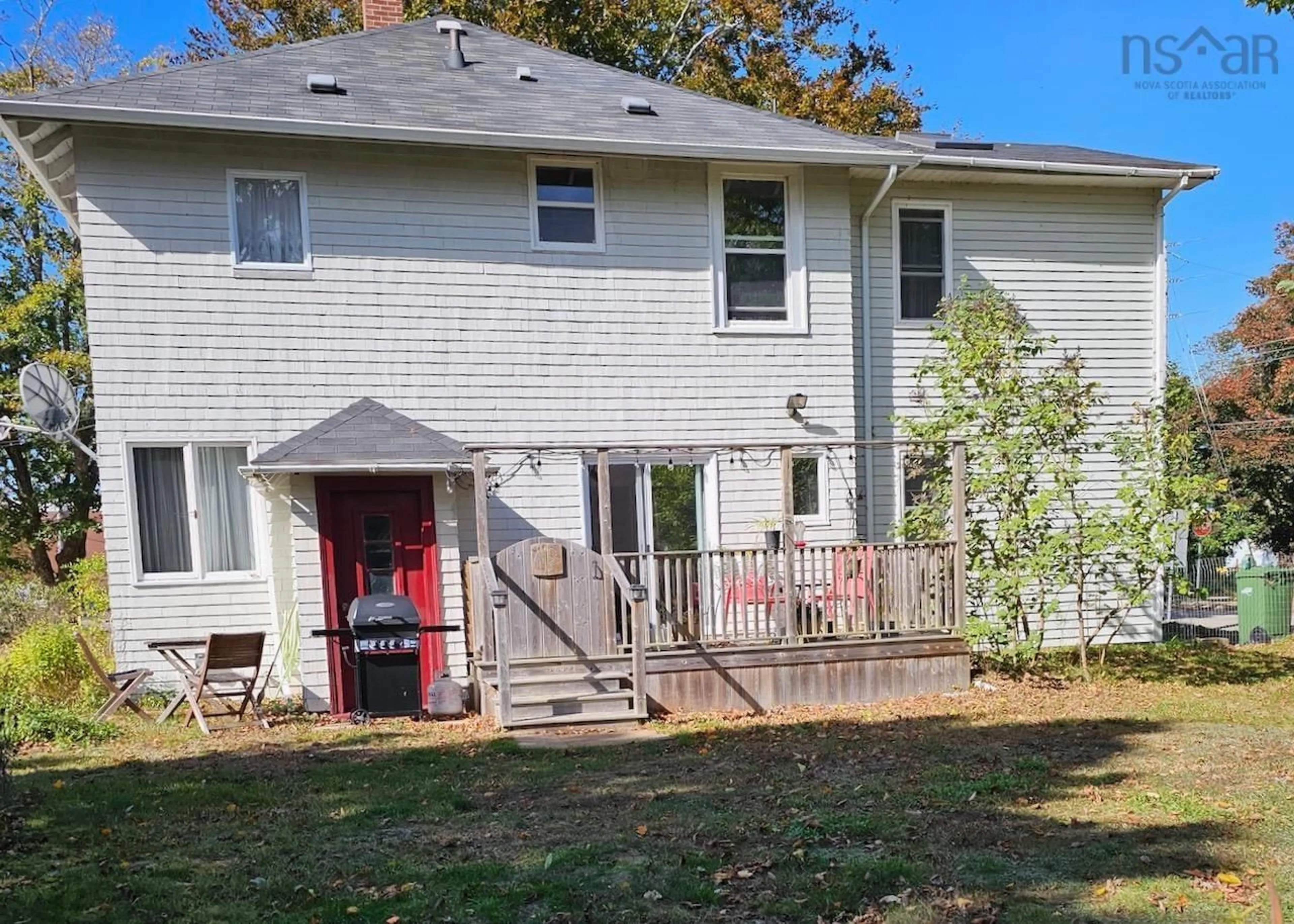 Frontside or backside of a home, the fenced backyard for 62 School St, Annapolis Royal Nova Scotia B0S 1A0