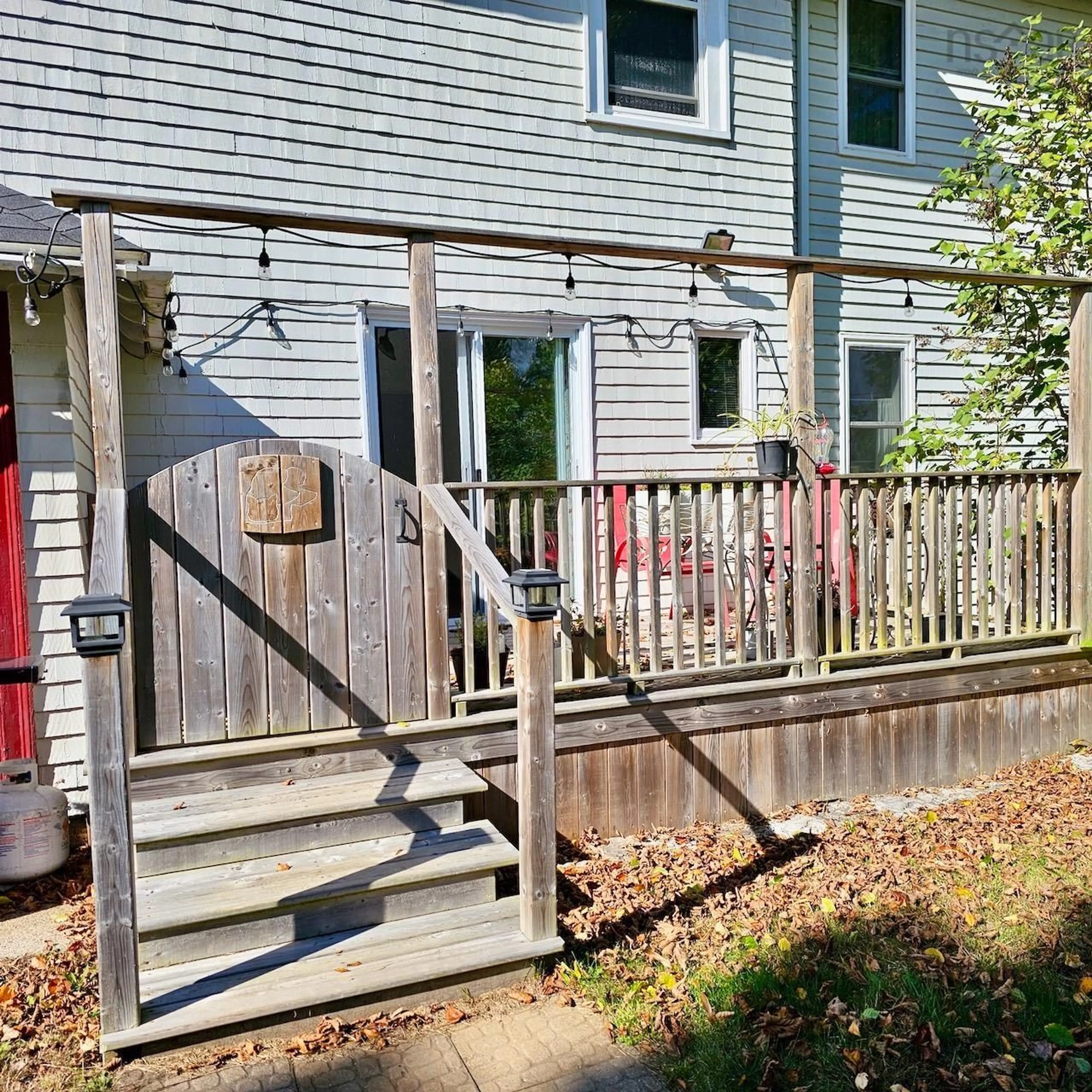 A pic from exterior of the house or condo, the fenced backyard for 62 School St, Annapolis Royal Nova Scotia B0S 1A0