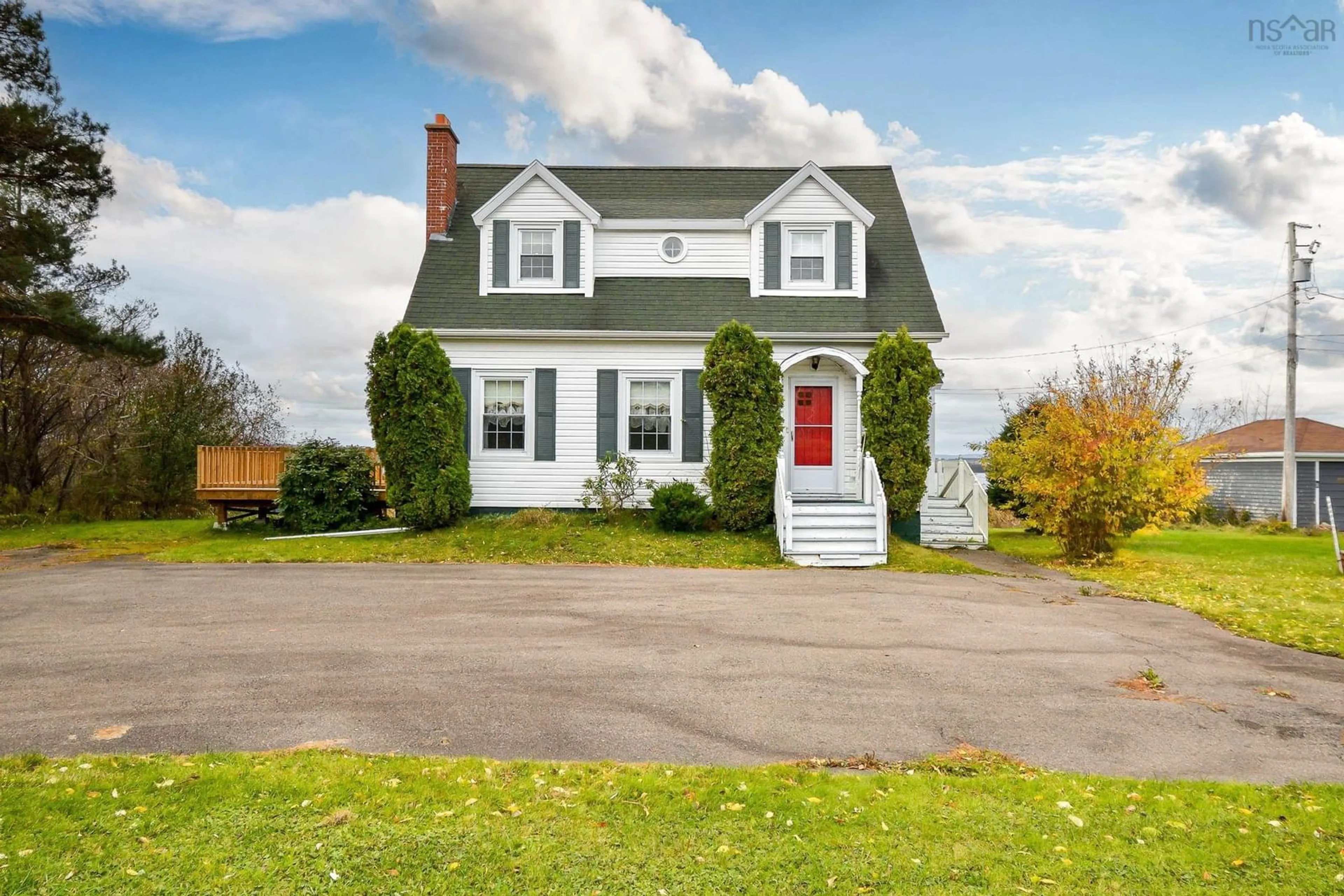 Frontside or backside of a home, cottage for 1883 New Waterford Hwy, South Bar Nova Scotia B1N 3H4