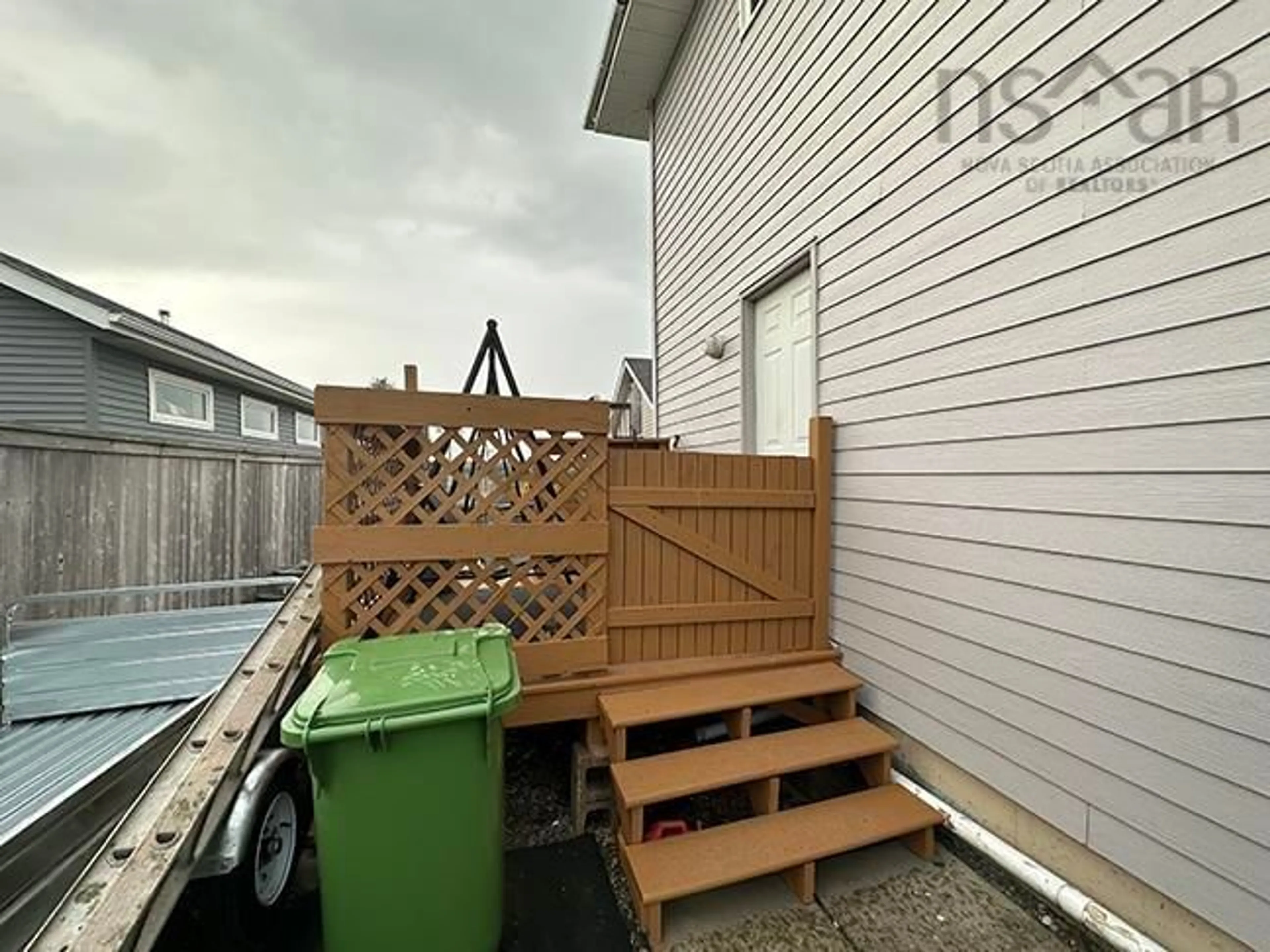 Patio, the fenced backyard for 216 & 218 Hiram St, Port Hawkesbury Nova Scotia B9A 2C2