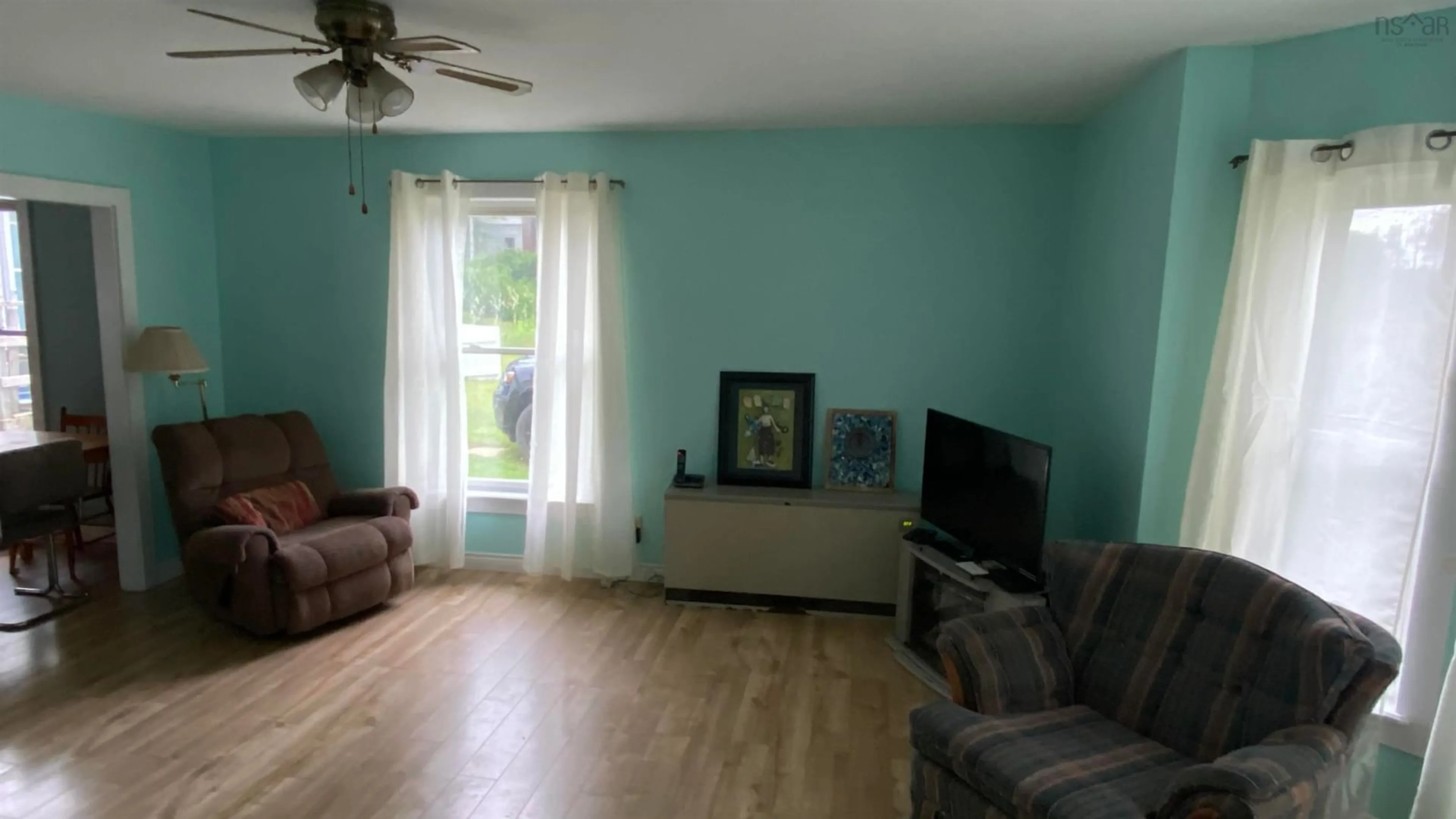 A pic of a room, wood floors for 21 Great Village Lornevale Rd, Great Village Nova Scotia B0M 1L0