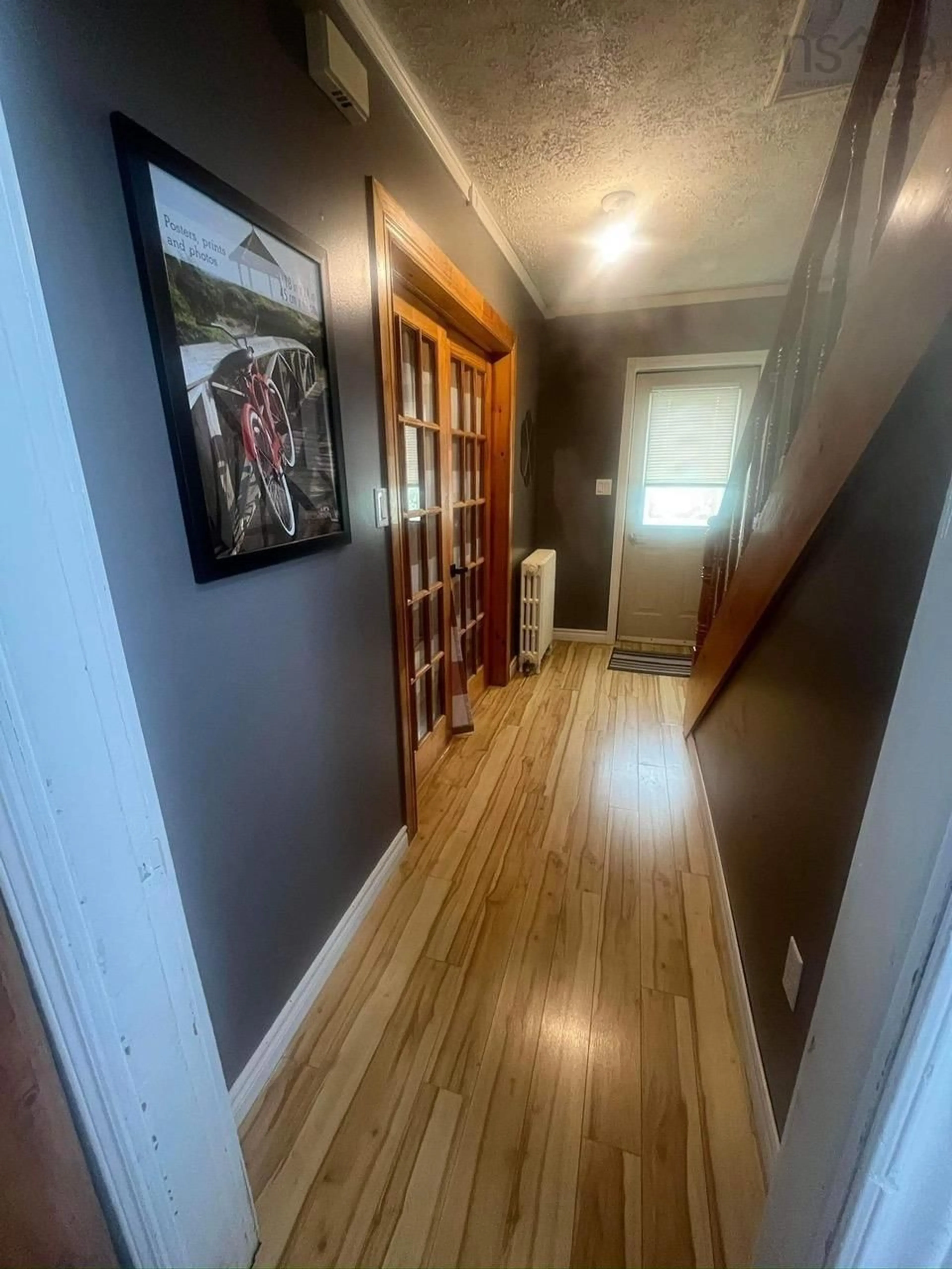 Indoor entryway, wood floors for 214 Centerville St, Reserve Mines Nova Scotia B1E 1A7