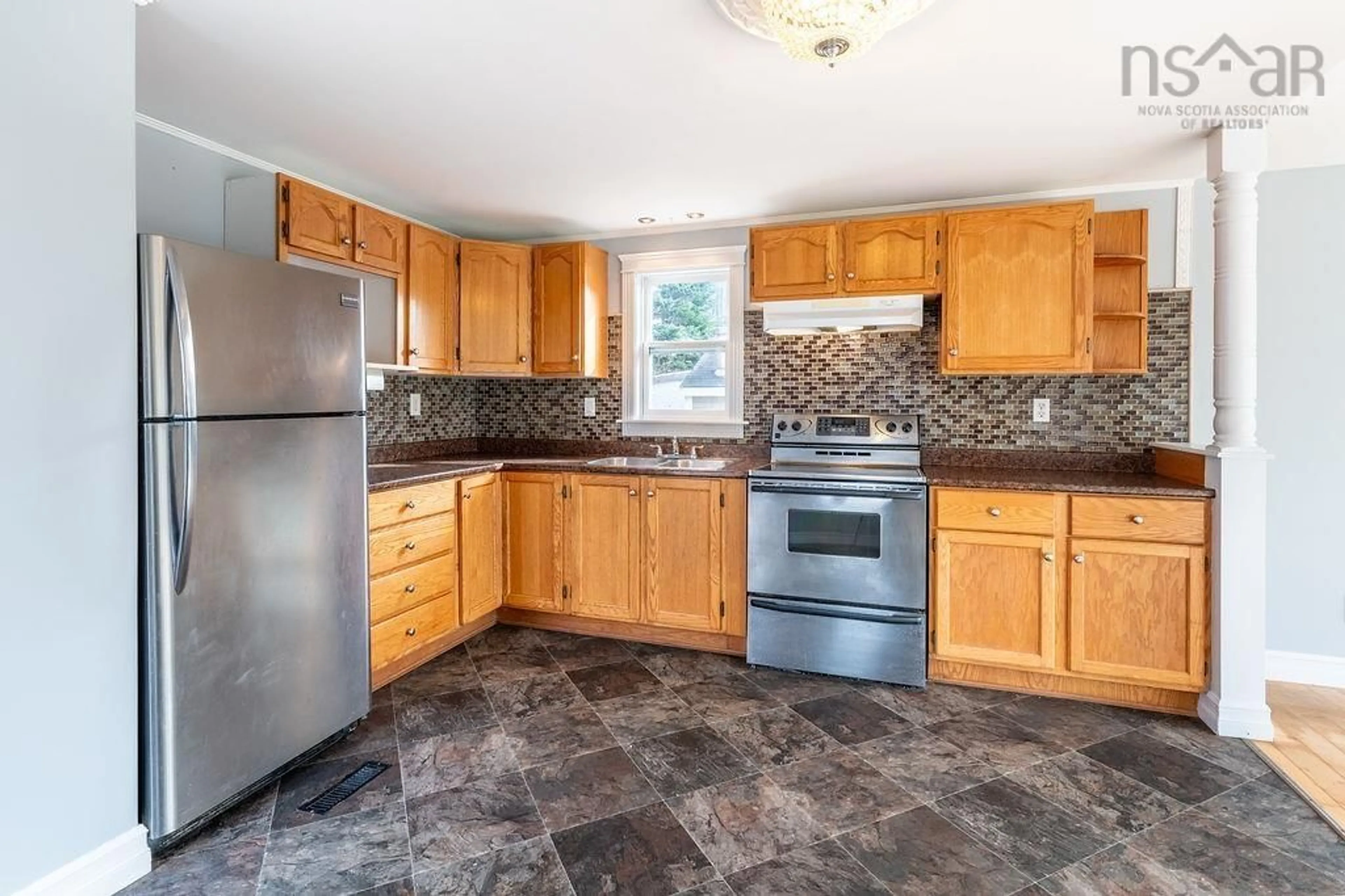 Standard kitchen, wood floors, cottage for 2493 Lawrencetown Rd, Lawrencetown Nova Scotia B2Z 1L1