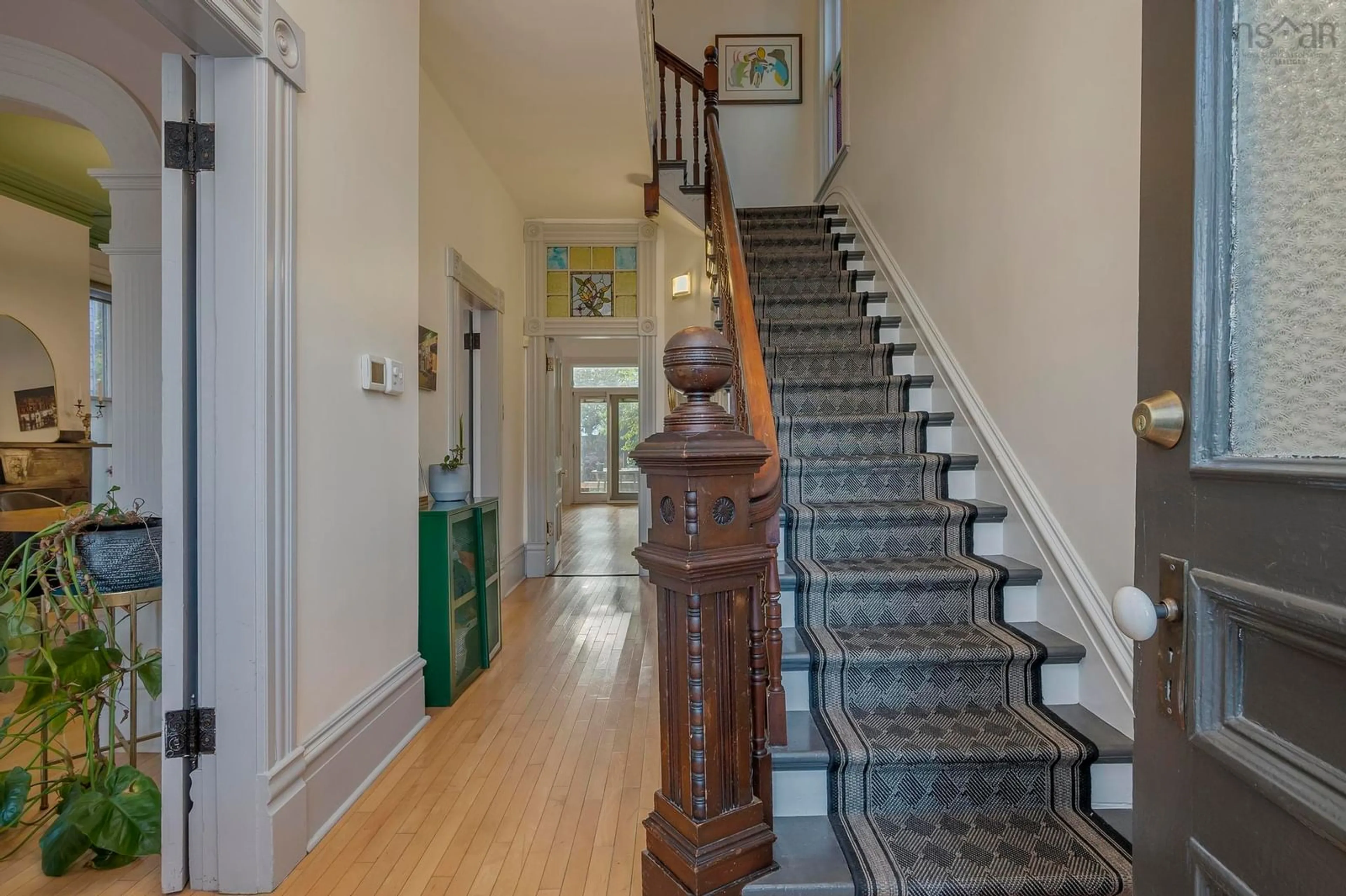 Indoor foyer, wood floors for 2428 Robie St, Halifax Nova Scotia B3K 4M7