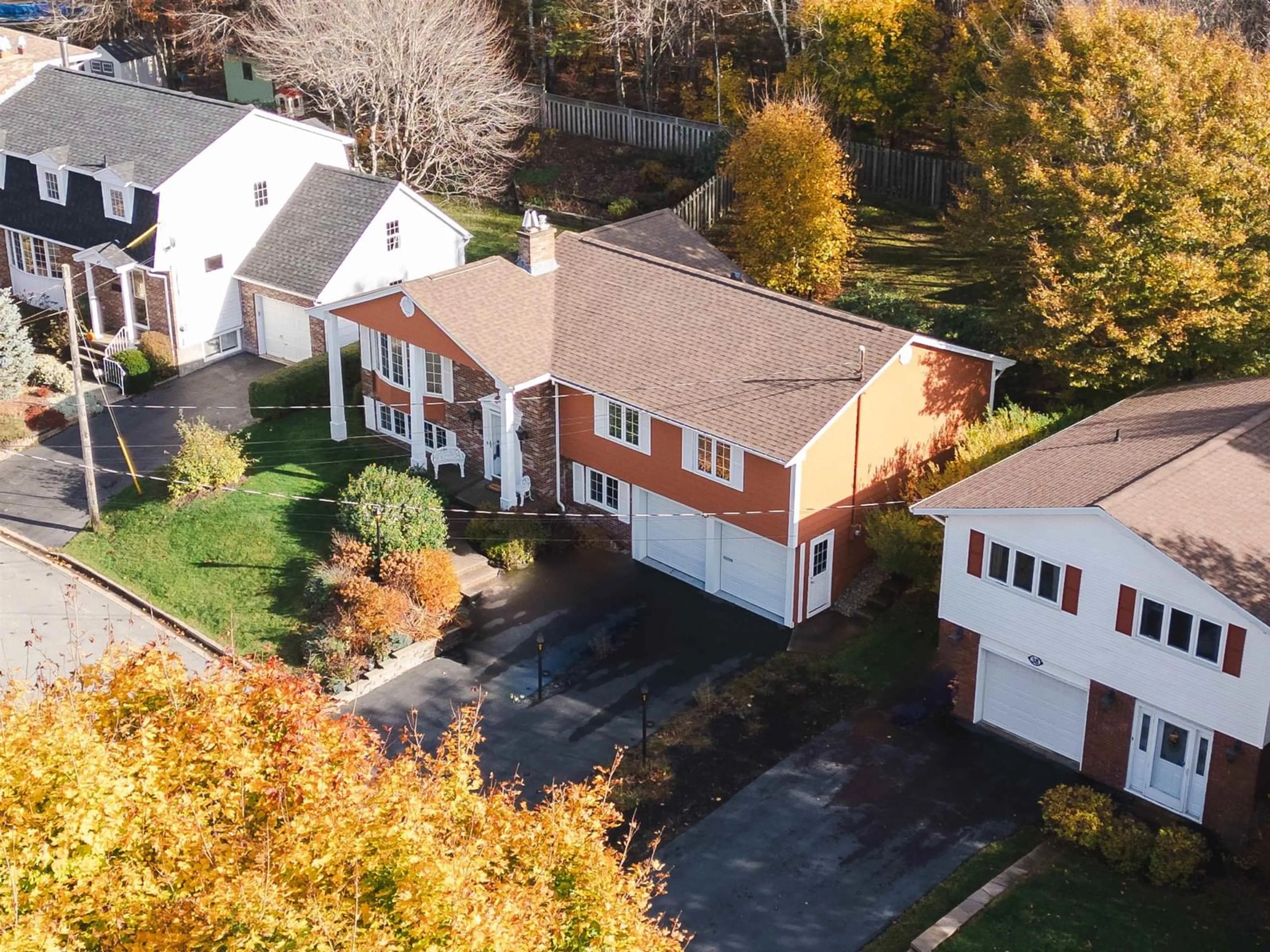 Frontside or backside of a home, the fenced backyard for 40 Kingston Cres, Dartmouth Nova Scotia B3A 2M2