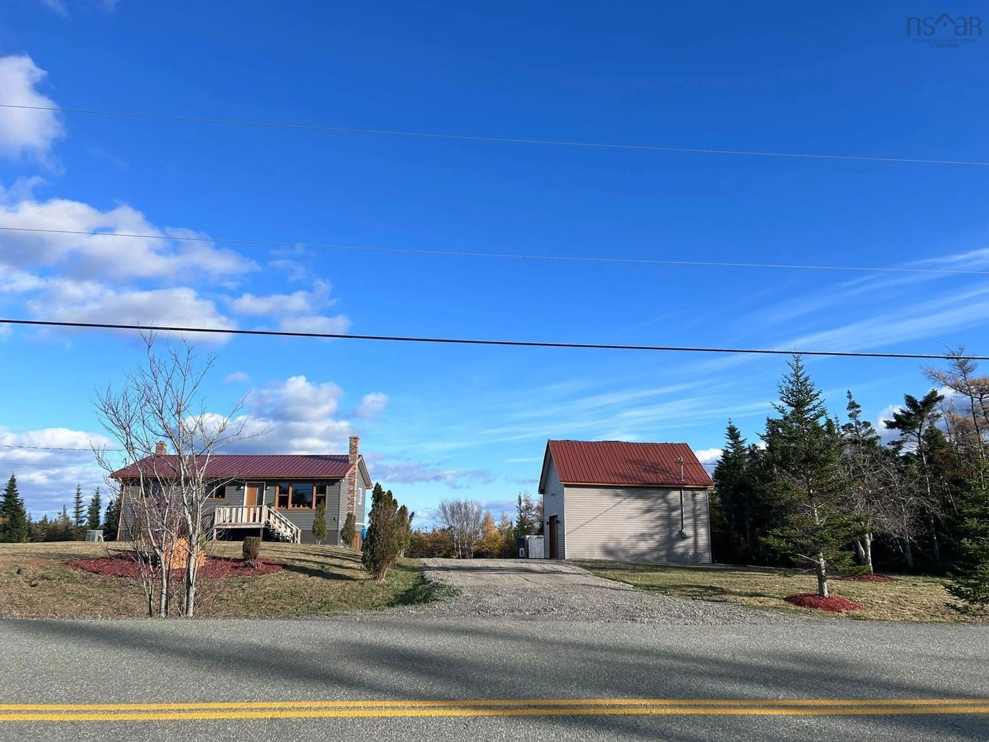 Frontside or backside of a home, the street view for 1853 Fourchu Rd, Gabarus Lake Nova Scotia B1K 2E7