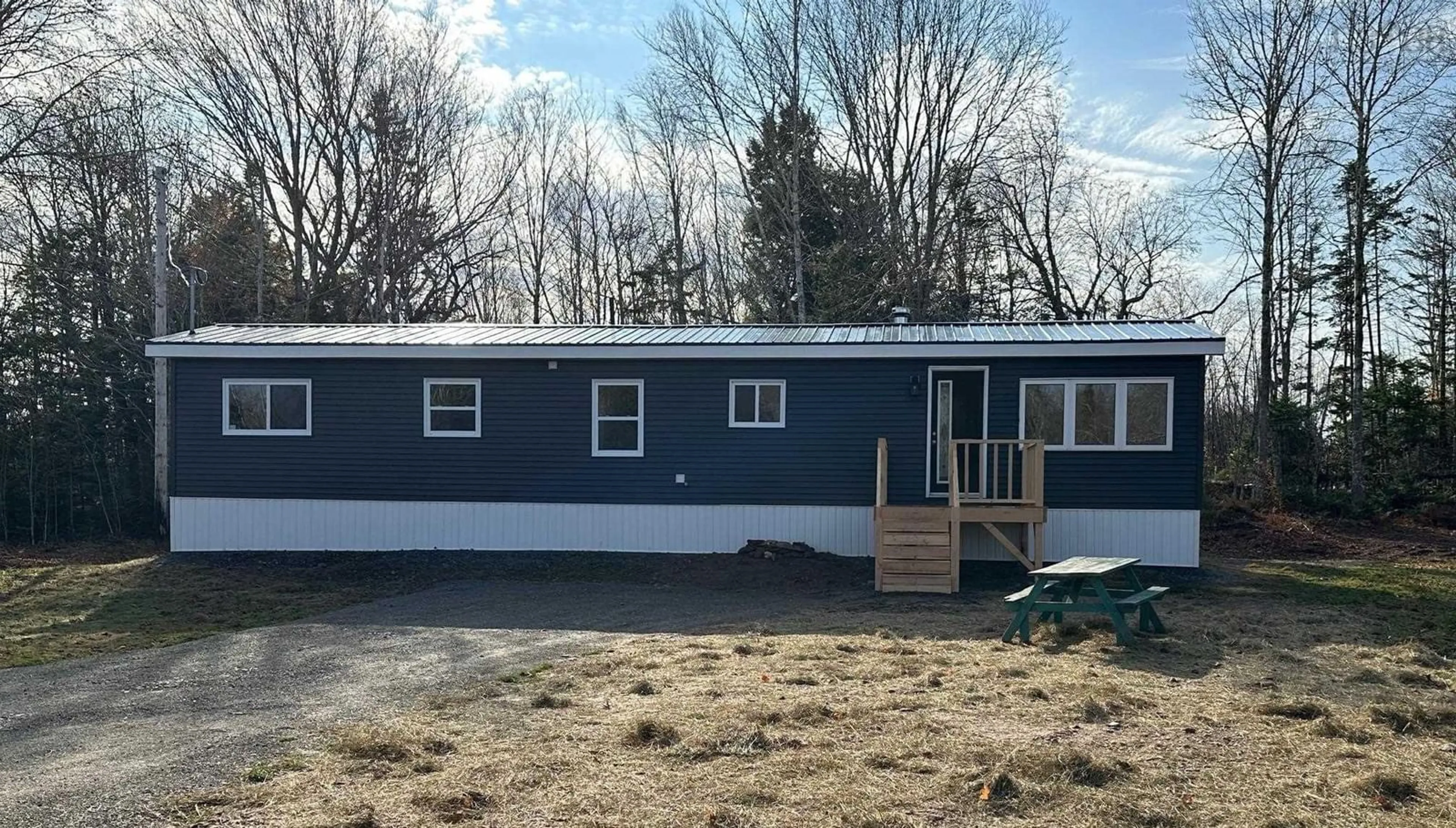 Home with vinyl exterior material for 811 Four Mile Brook Rd, Four Mile Brook Nova Scotia B0K 1R0