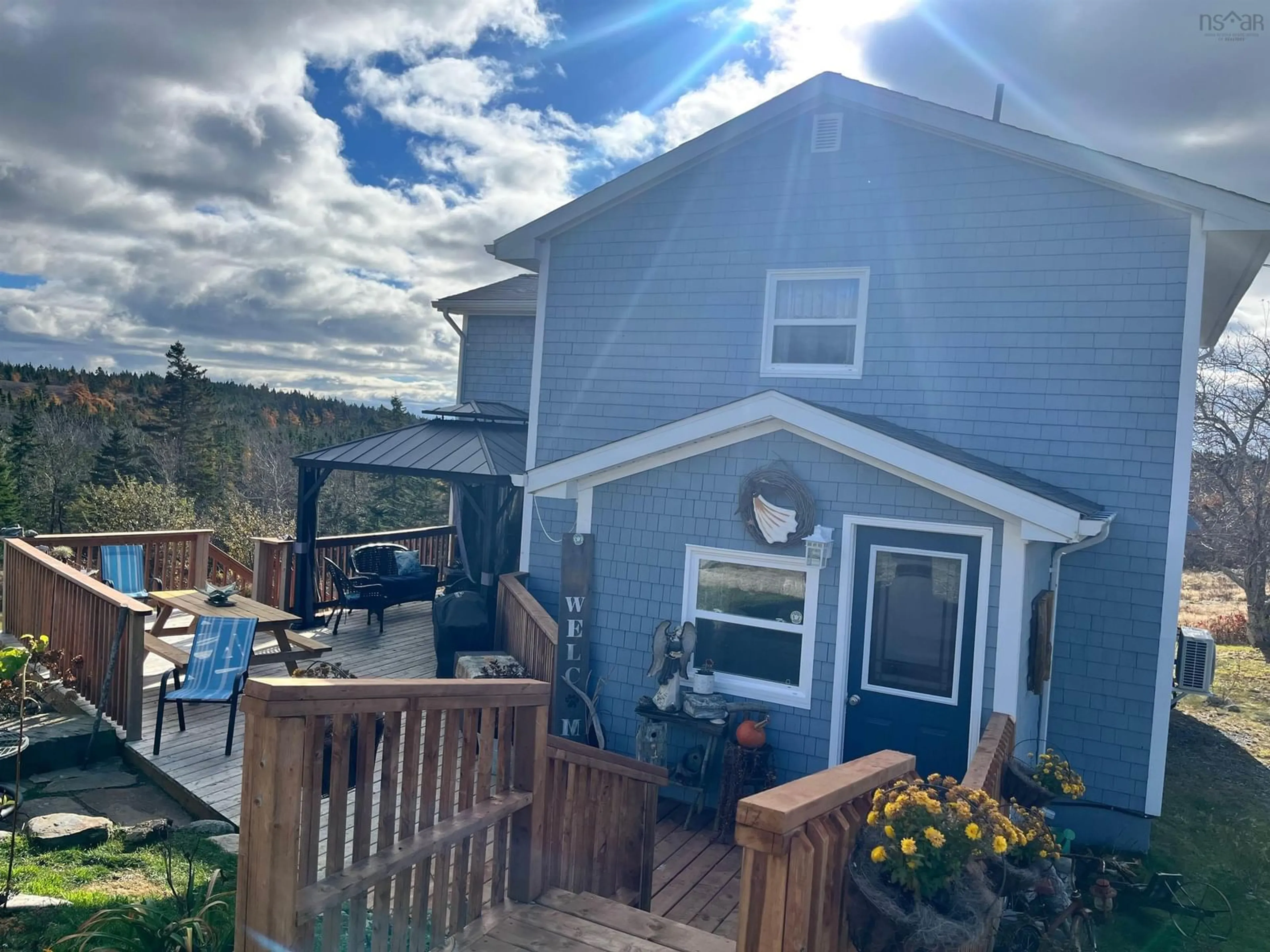 A pic from exterior of the house or condo, the fenced backyard for 130 Larry's River Road, Larry's River Nova Scotia B0H 1T0