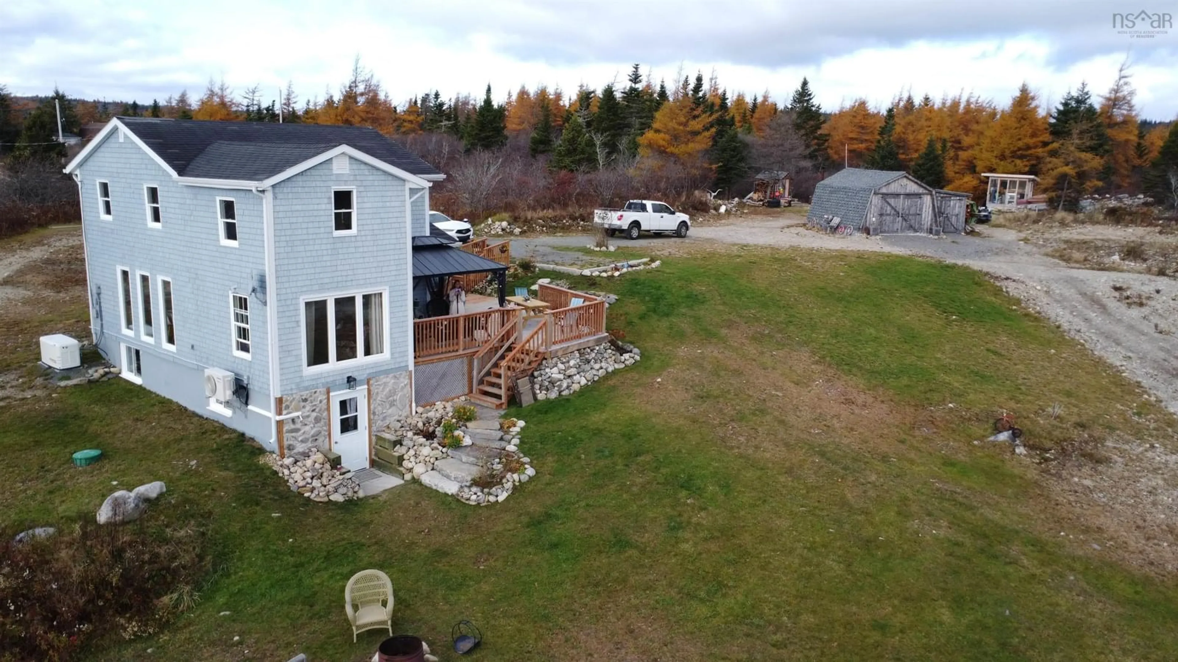 Frontside or backside of a home, the fenced backyard for 130 Larry's River Road, Larry's River Nova Scotia B0H 1T0