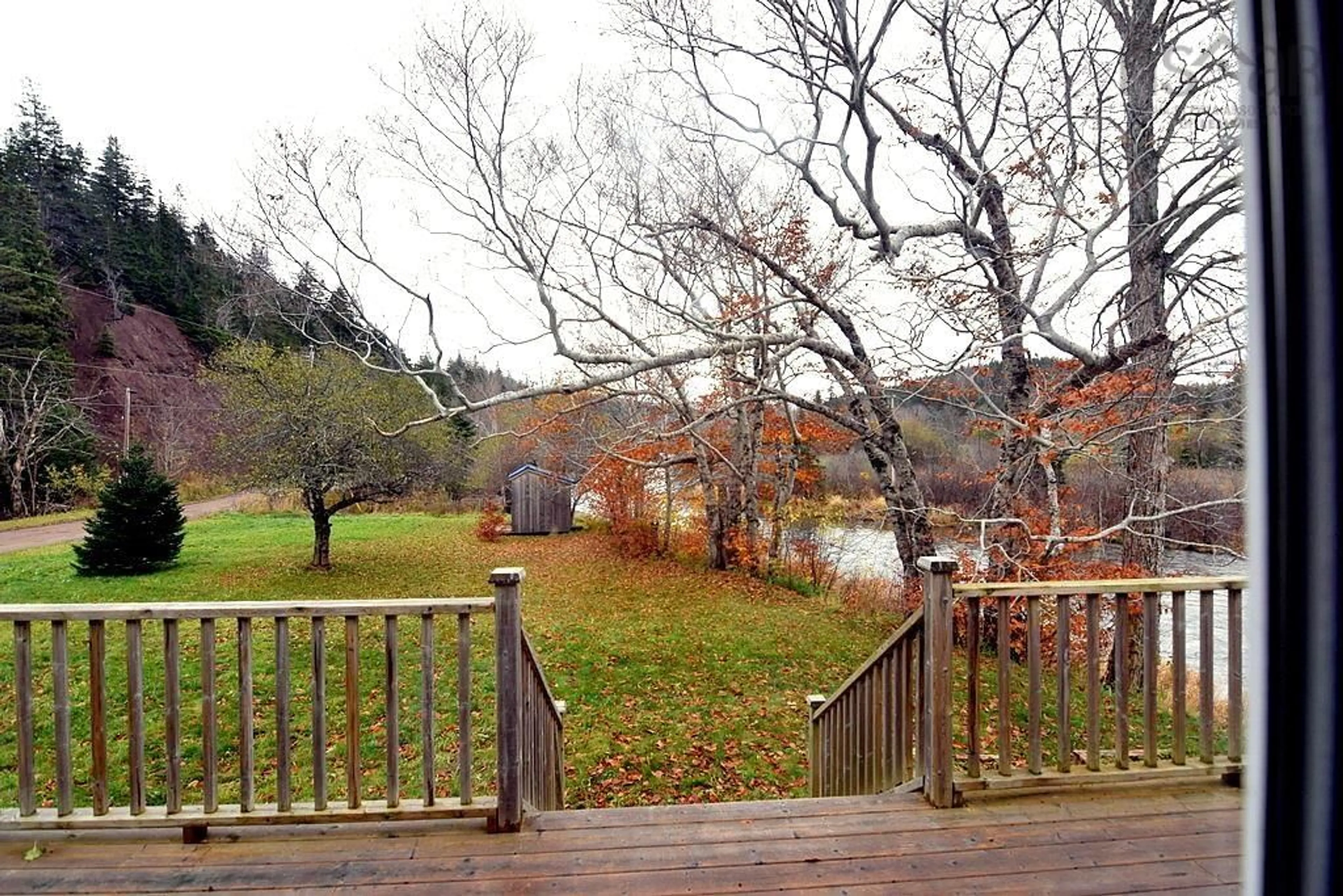 Patio, the fenced backyard for 664 South West Margaree Rd, South West Margaree Nova Scotia B0E 3H0