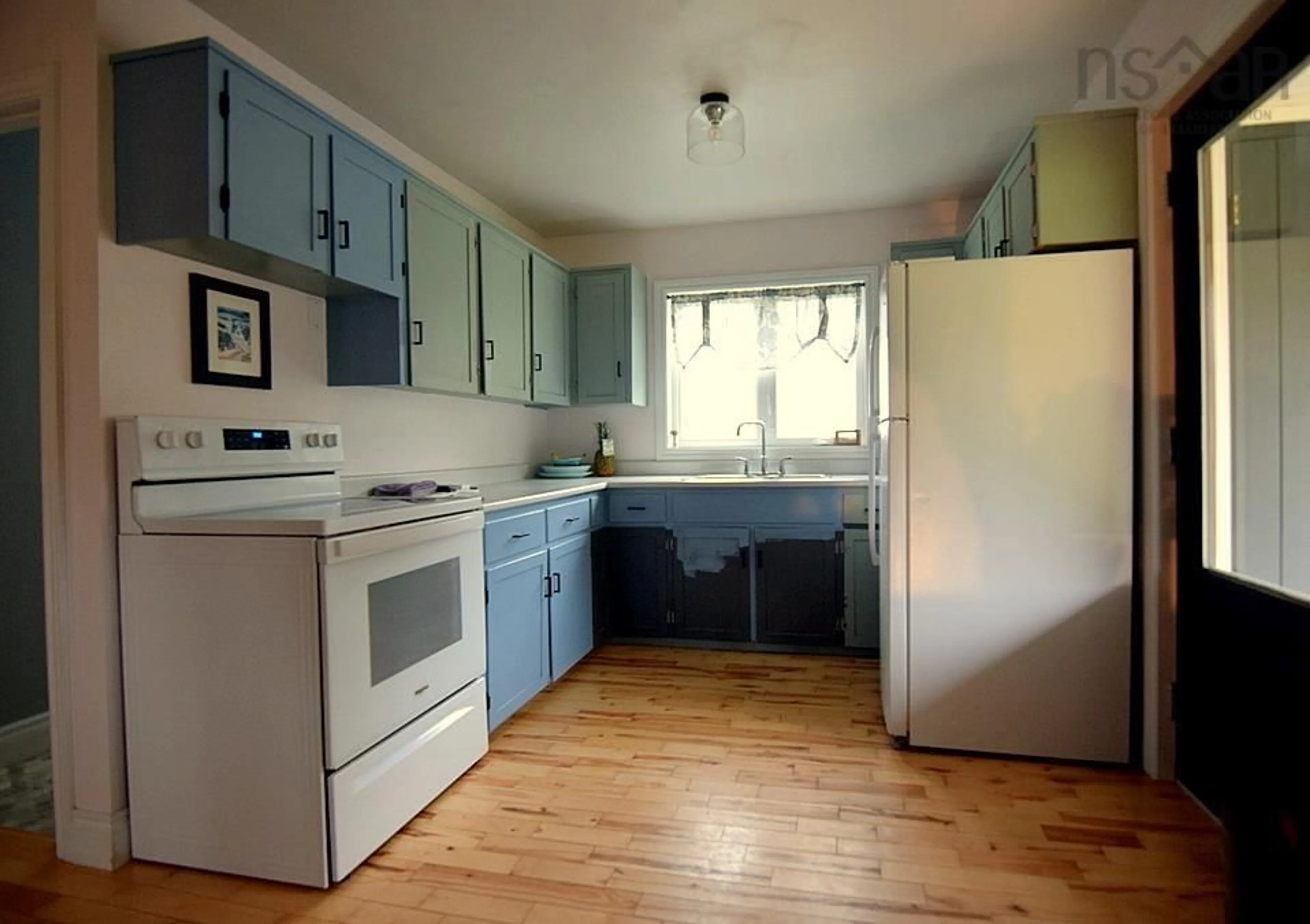 Standard kitchen, wood floors, cottage for 664 South West Margaree Rd, South West Margaree Nova Scotia B0E 3H0