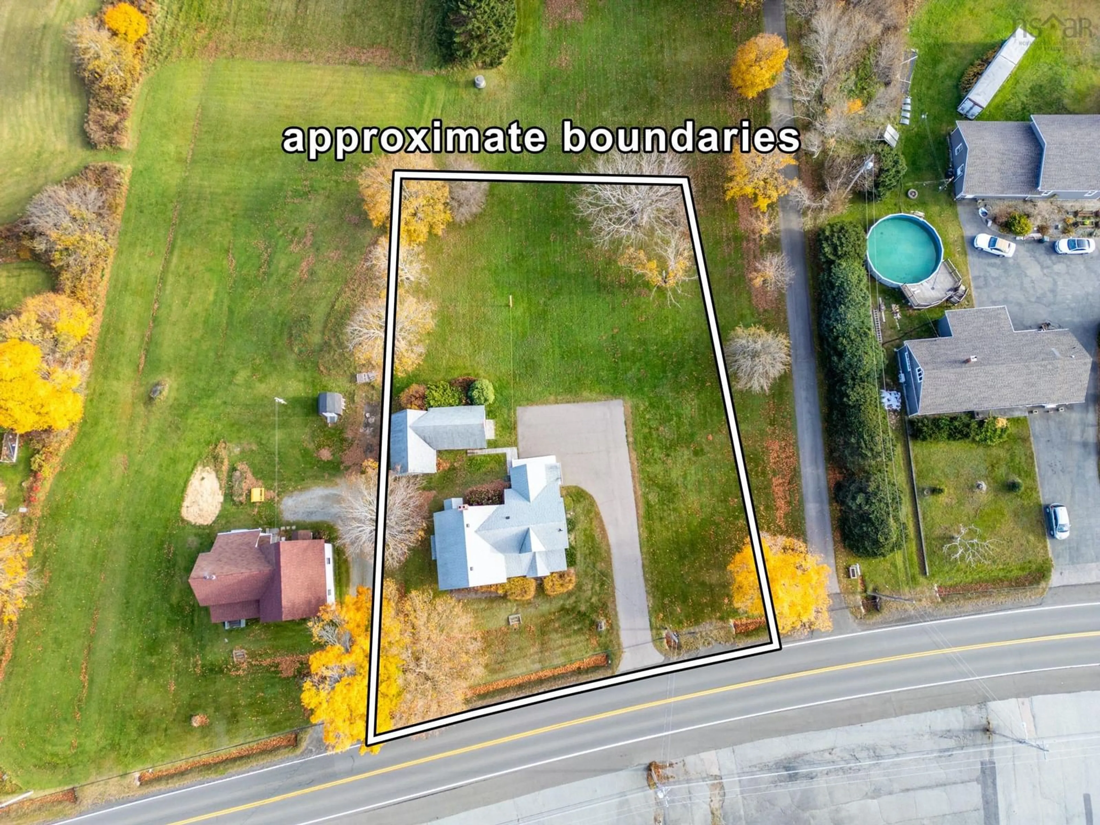 Frontside or backside of a home, the fenced backyard for 3152 Highway 1, Belliveaus Cove Nova Scotia B0W 3T0