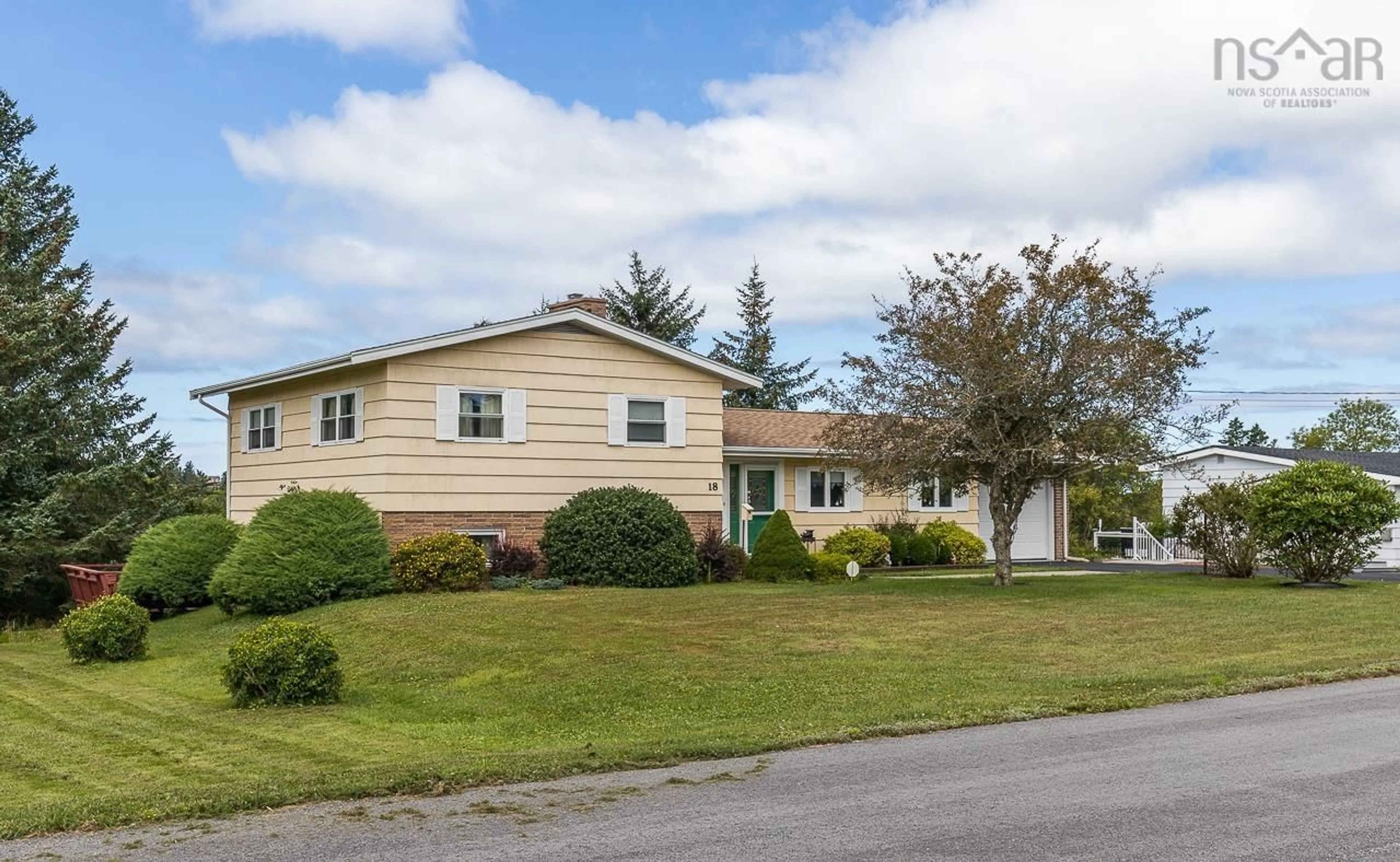 Frontside or backside of a home, the street view for 18 Goodwin Dr, Dayton Nova Scotia B5A 4H8