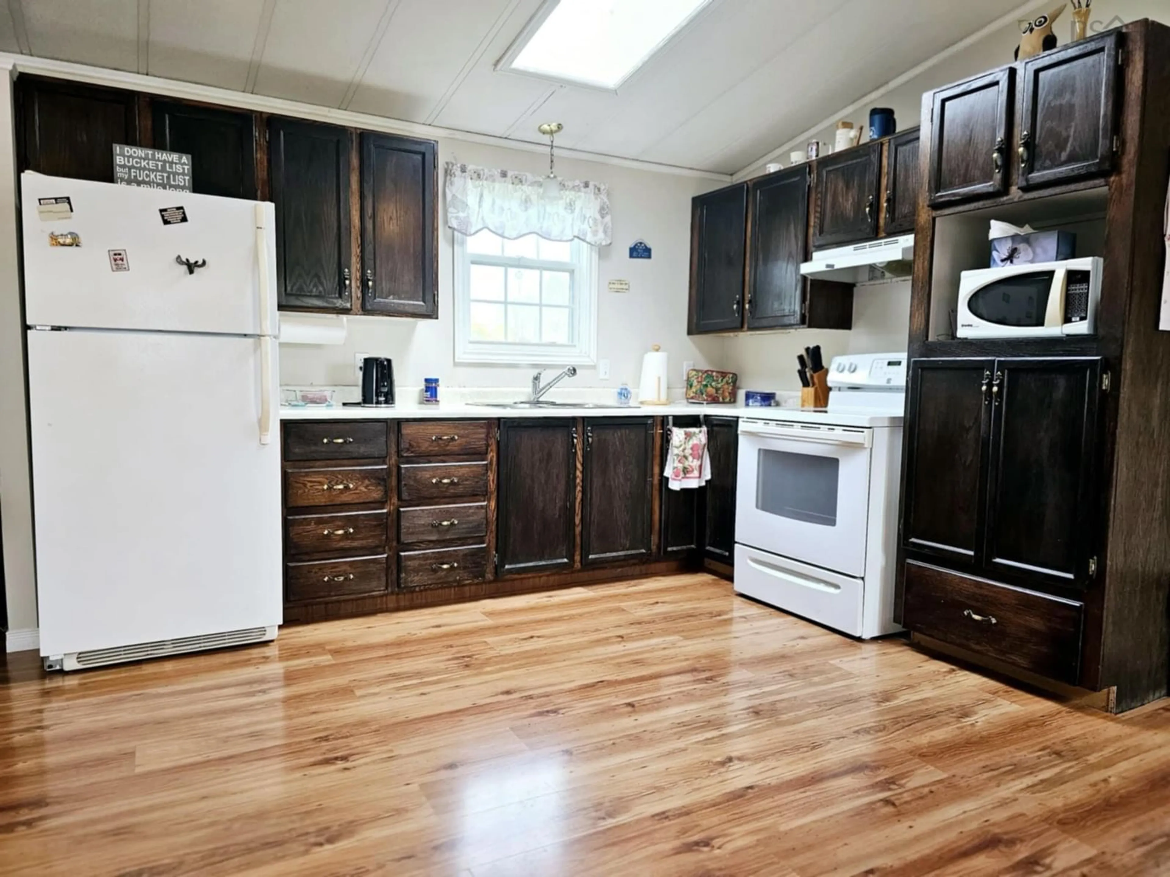 Standard kitchen, wood floors, cottage for 1460 Salmon River Rd, Salmon River Nova Scotia B6L 4E2