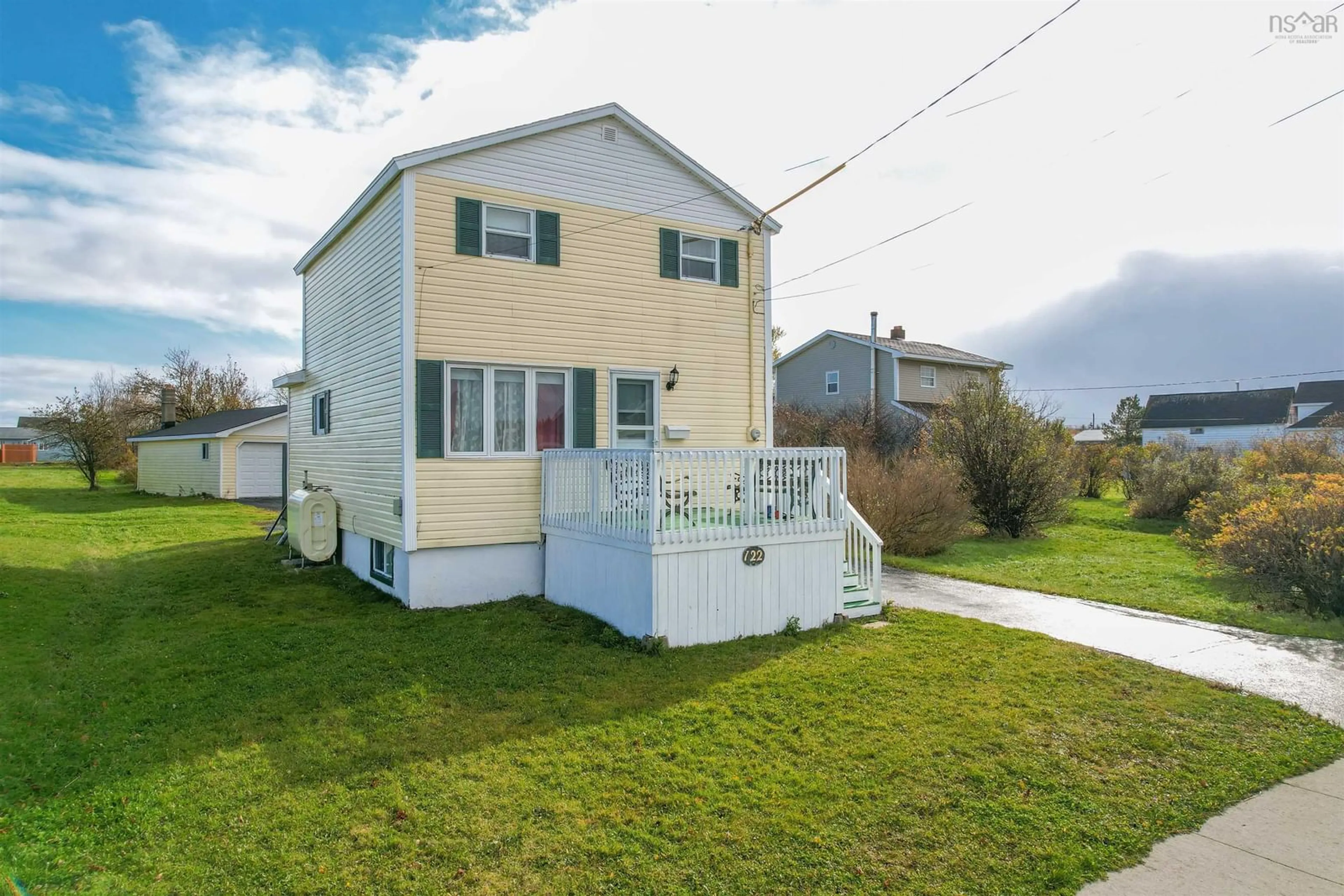 A pic from exterior of the house or condo, the fenced backyard for 122 Wallace Rd, Glace Bay Nova Scotia B1A 4N7