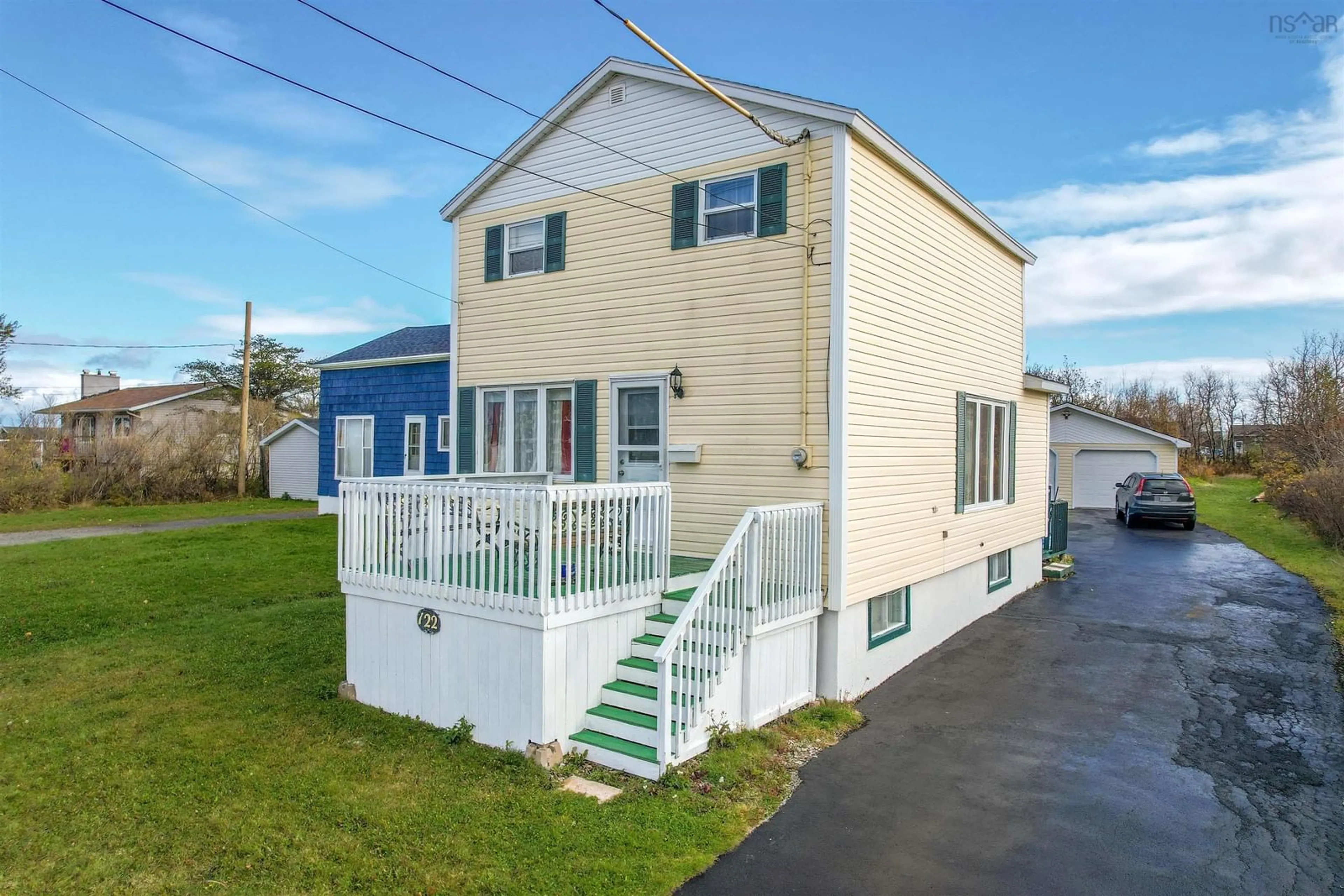 A pic from exterior of the house or condo, the fenced backyard for 122 Wallace Rd, Glace Bay Nova Scotia B1A 4N7