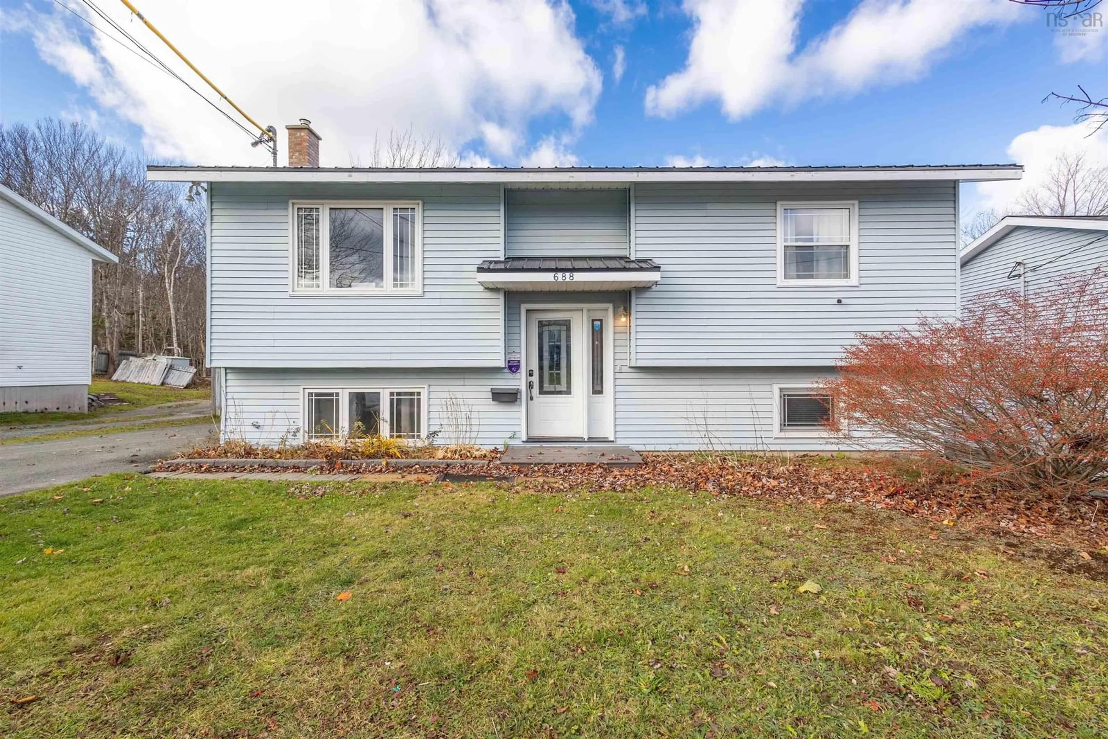 Frontside or backside of a home, the fenced backyard for 688 Cottage Rd, Sydney Nova Scotia B1P 6S6