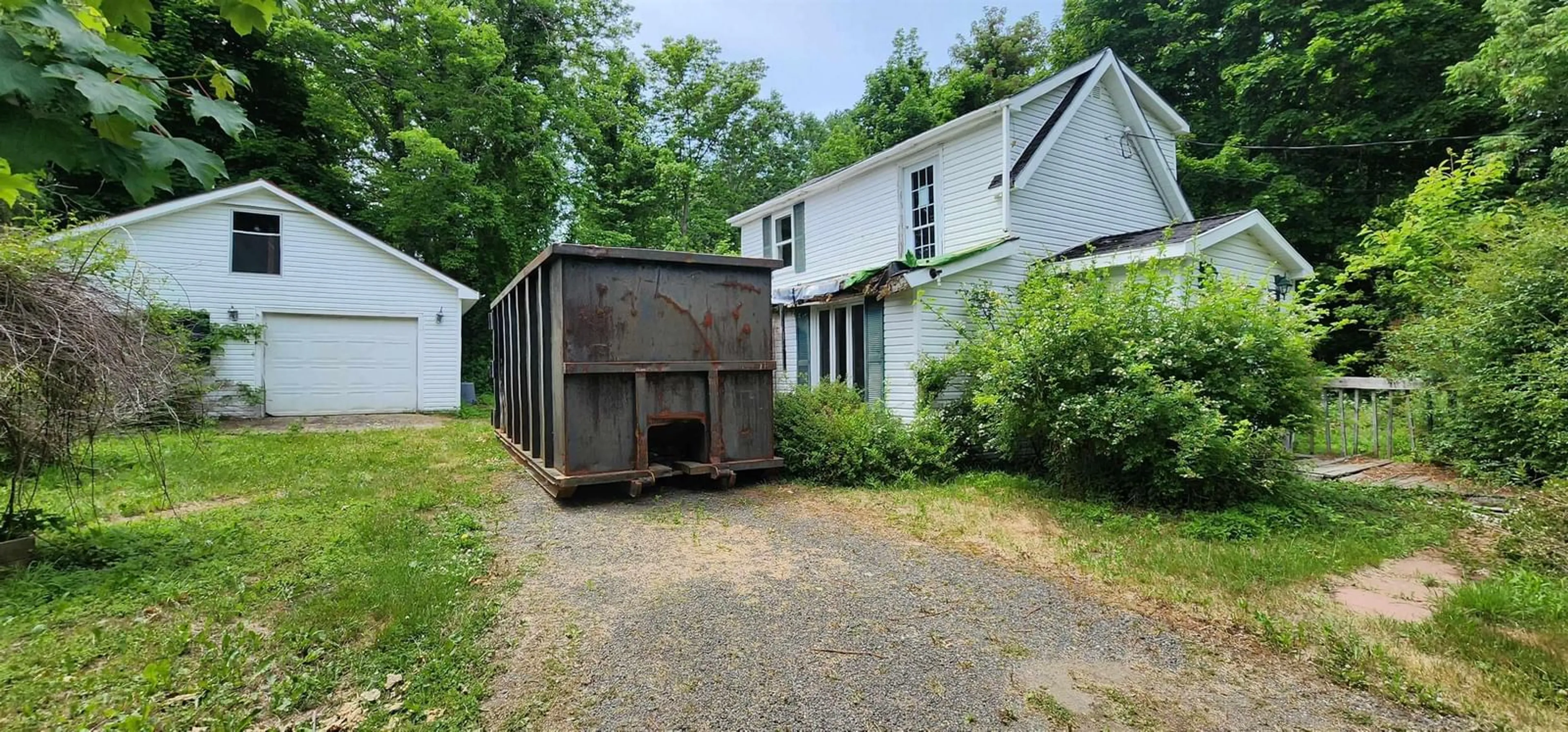 Frontside or backside of a home, the fenced backyard for 25 Jaggers Lane, Smiths Cove Nova Scotia B0S 1S0