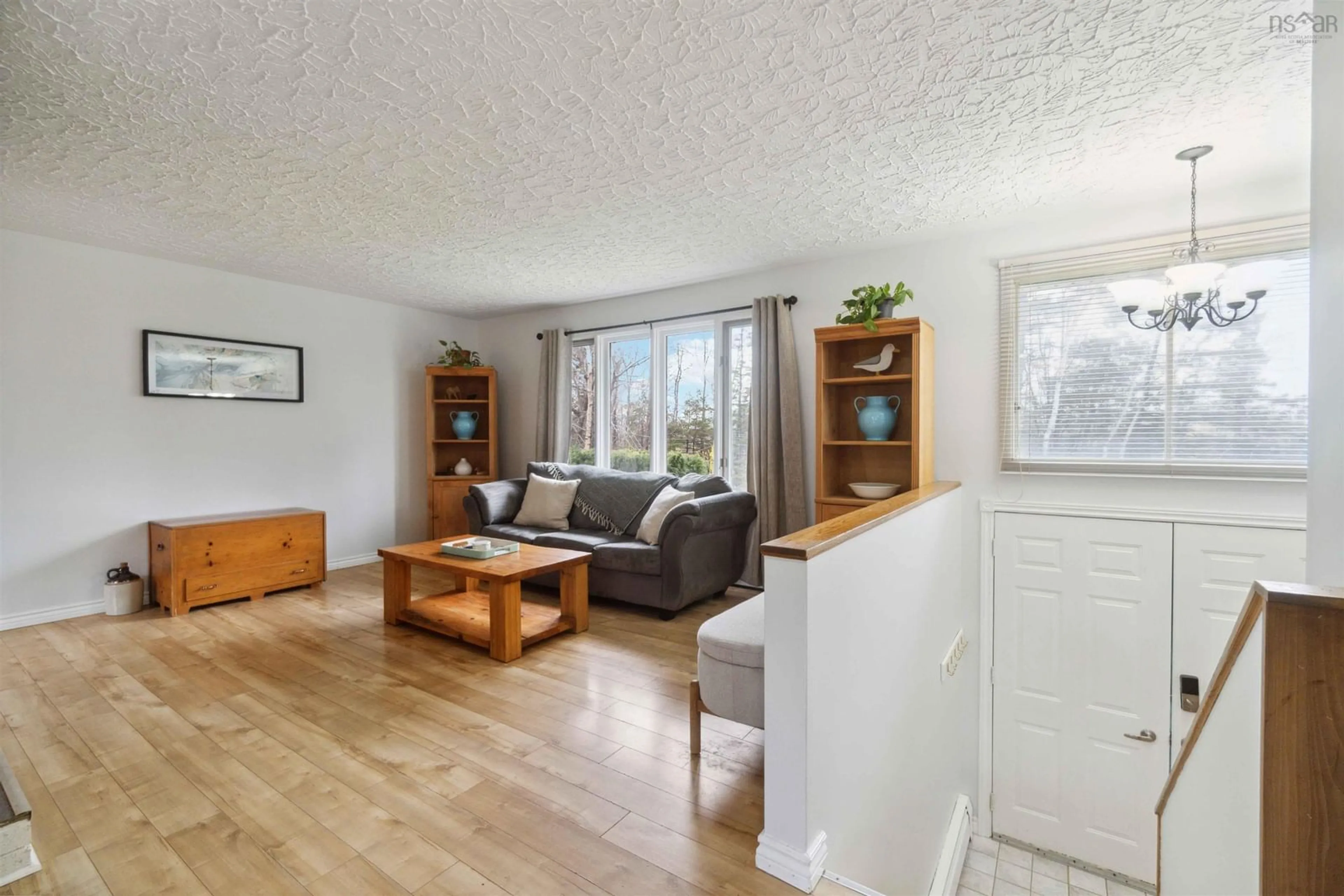 Living room, wood floors for 3111 Lawrencetown Rd, Lawrencetown Nova Scotia B2Z 1R7