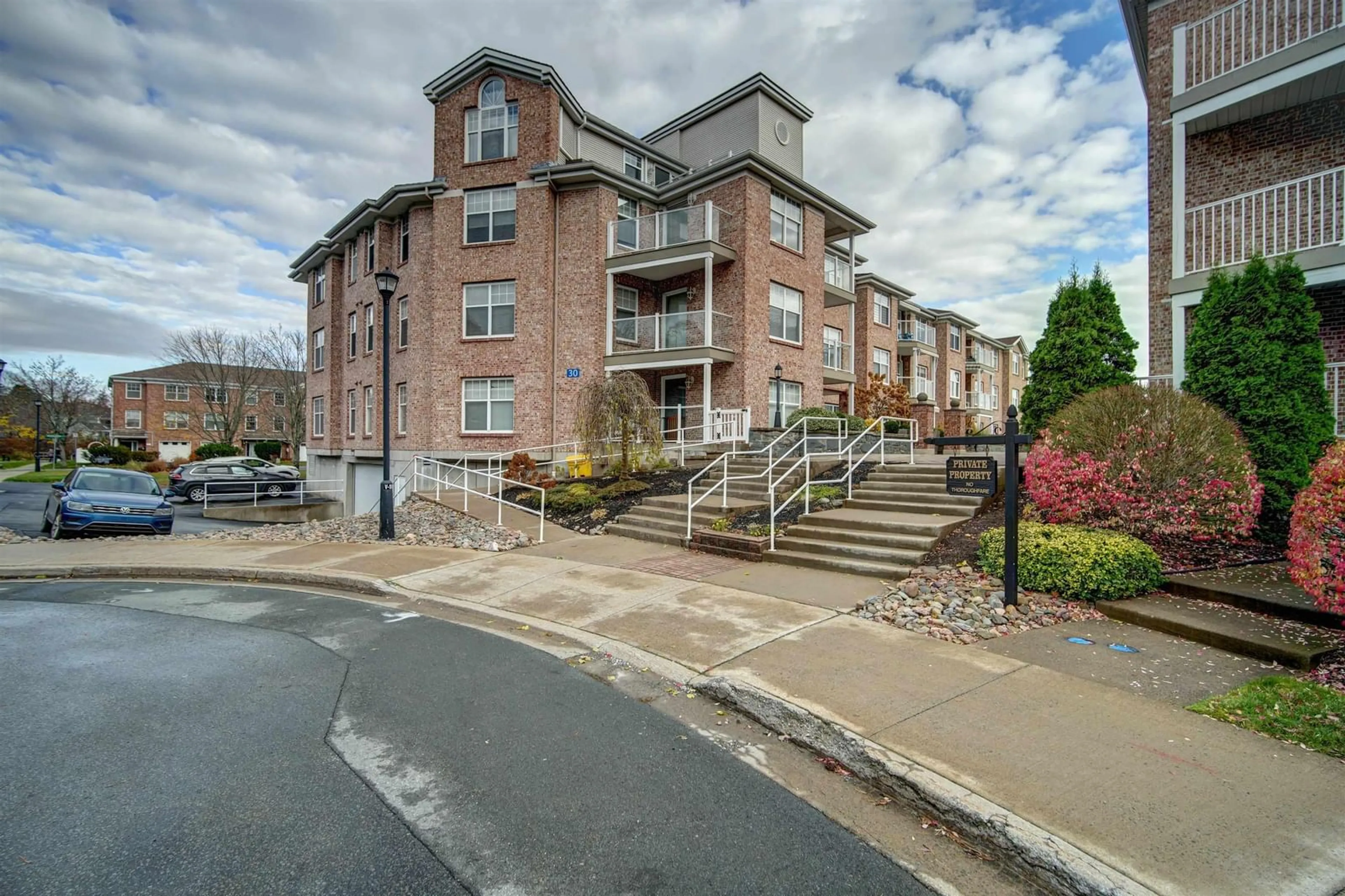 A pic from exterior of the house or condo, the street view for 30 Waterfront Dr #206, Bedford Nova Scotia B4H 4H2