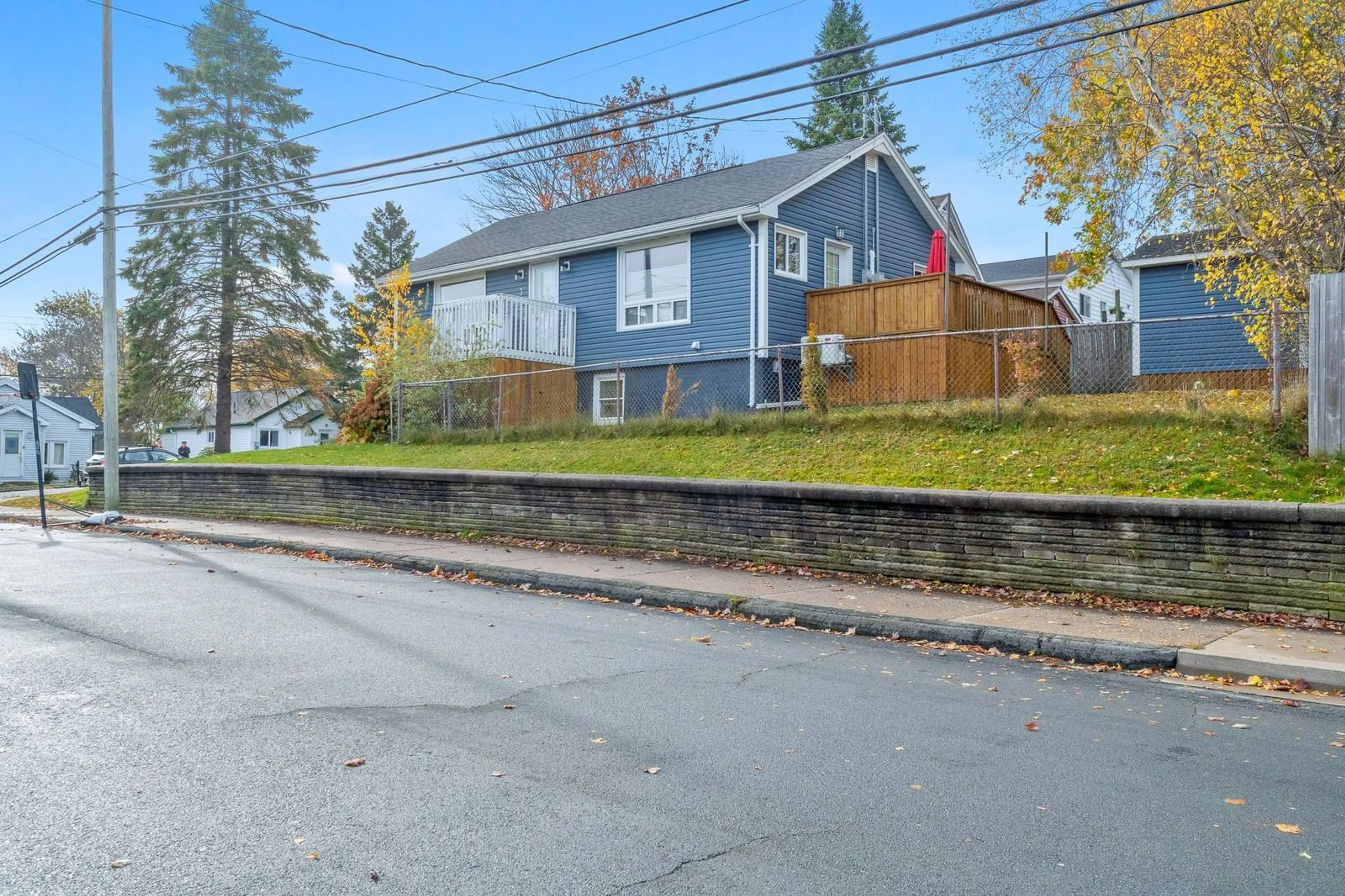 Frontside or backside of a home, the fenced backyard for 3 Alex St, Fairview Nova Scotia B3N 2W1