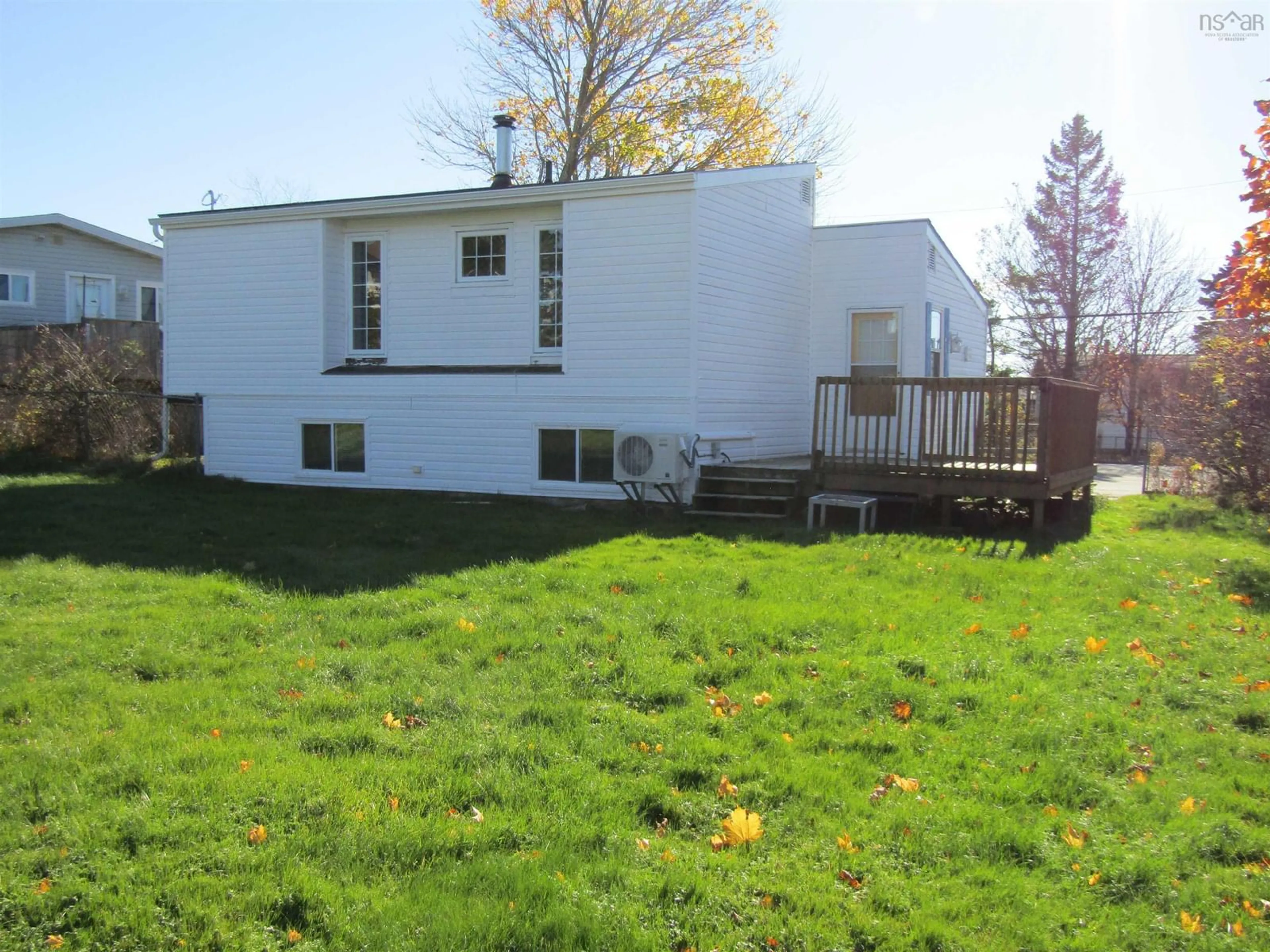 A pic from exterior of the house or condo, the fenced backyard for 92 Redoubt Way, Eastern Passage Nova Scotia B3G 1E7