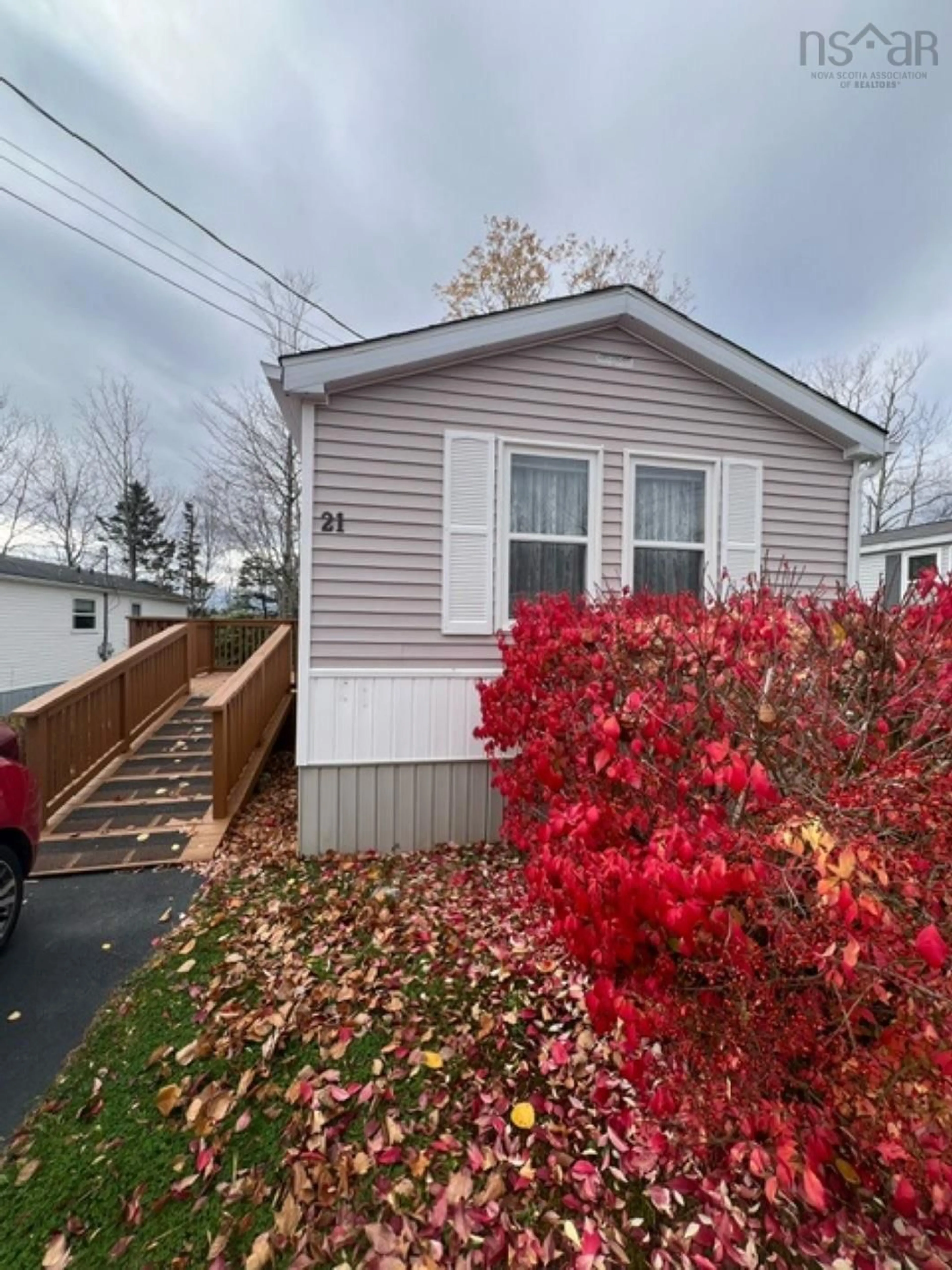 Home with vinyl exterior material for 21 Moore Dr, Middle Sackville Nova Scotia B4E 2Y5