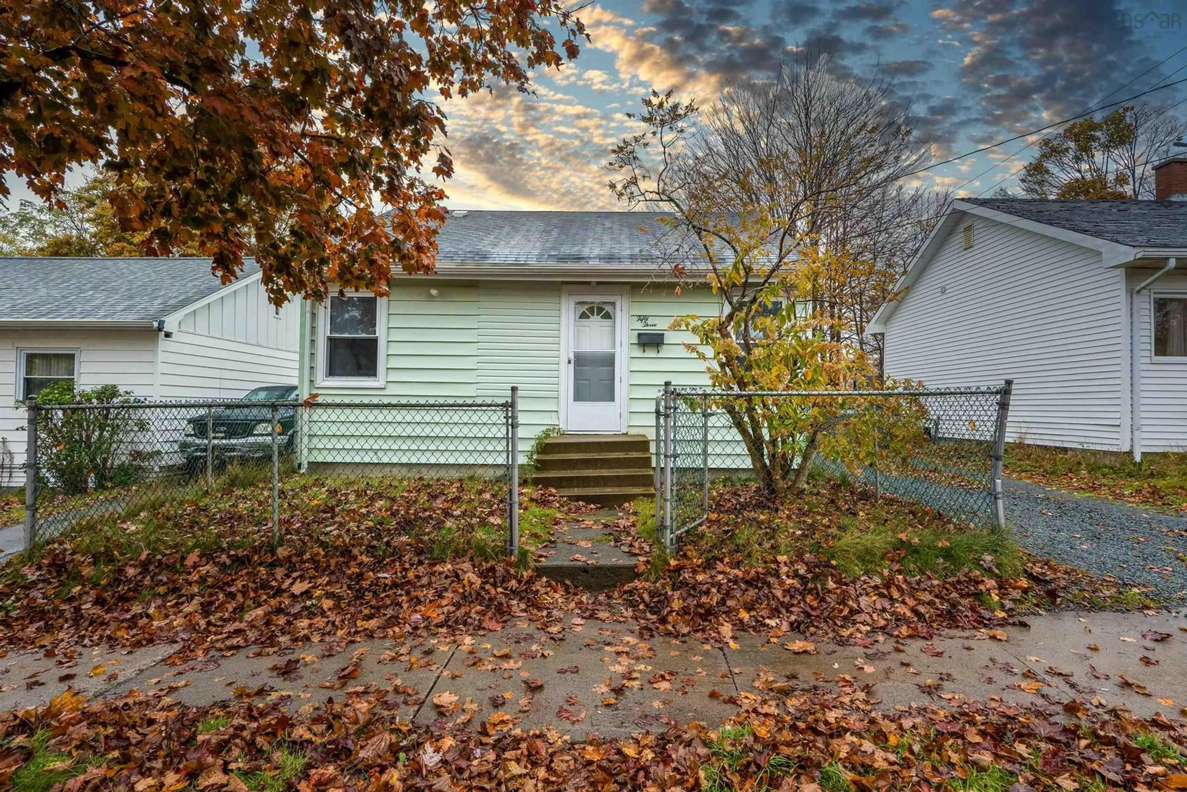 A pic from exterior of the house or condo, the fenced backyard for 53 Chappell St, Dartmouth Nova Scotia B3A 3P3