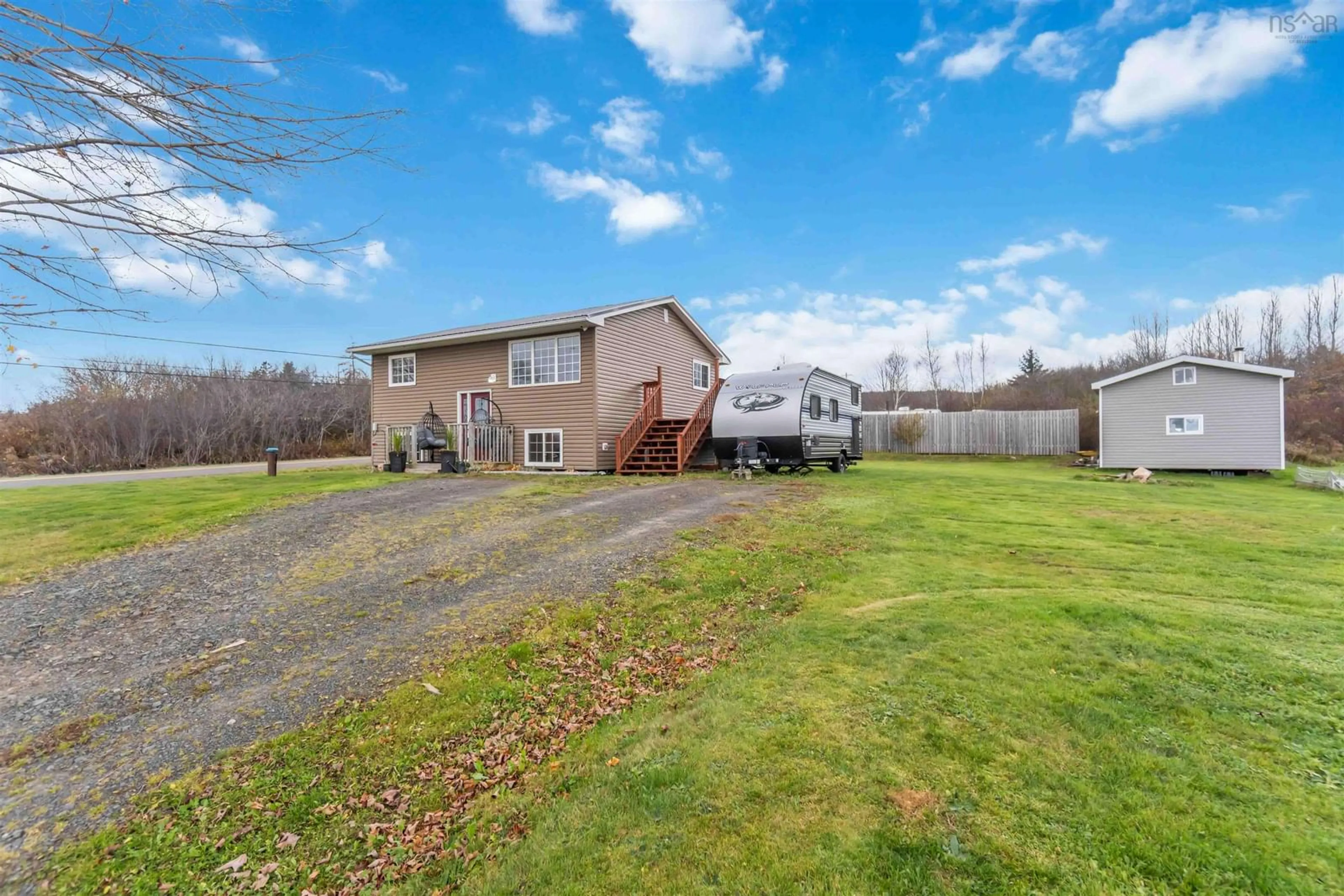 Frontside or backside of a home, the fenced backyard for 66 Garnet Oliver Dr, Mount Pleasant Nova Scotia B0V 1A0