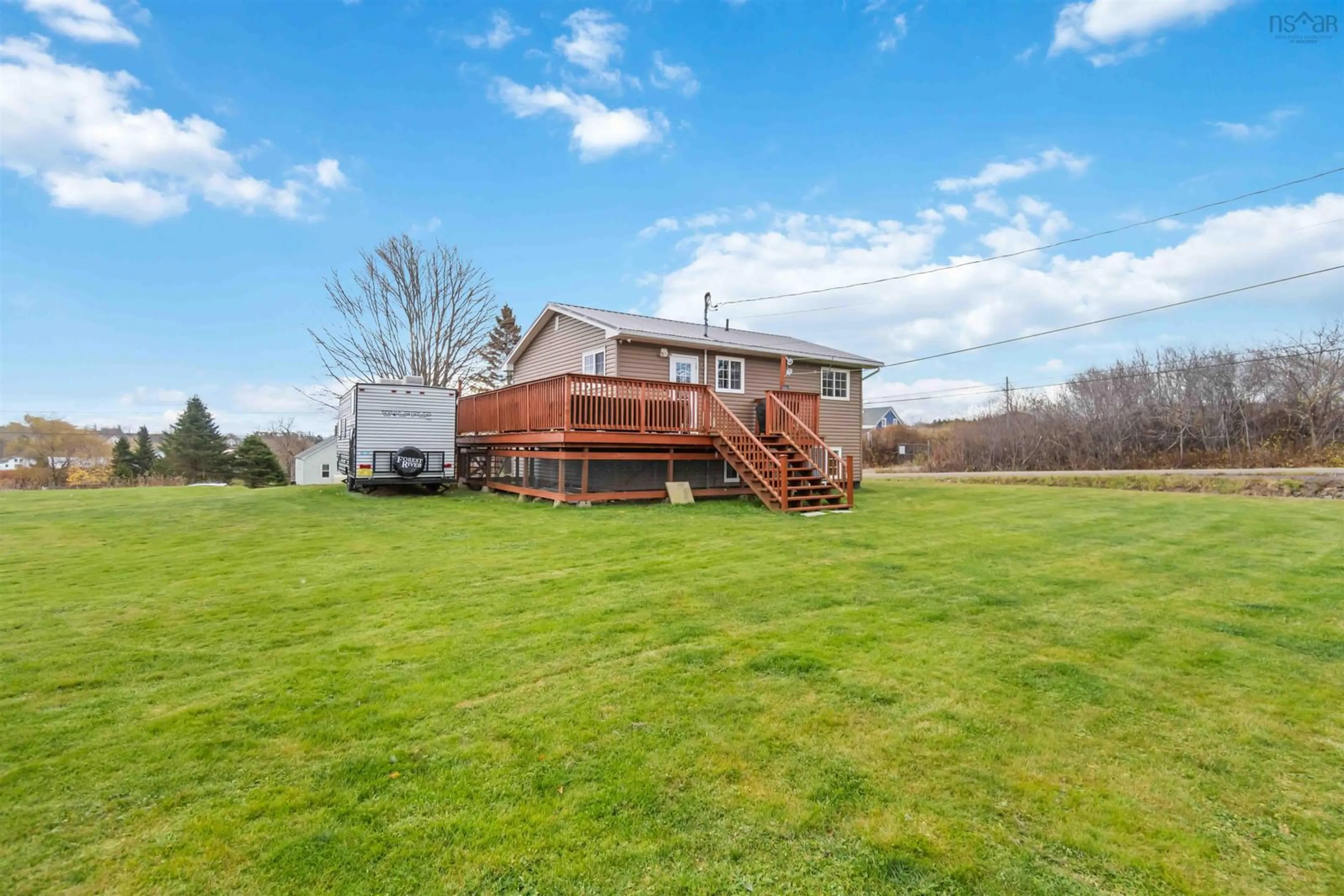 Frontside or backside of a home, the fenced backyard for 66 Garnet Oliver Dr, Mount Pleasant Nova Scotia B0V 1A0