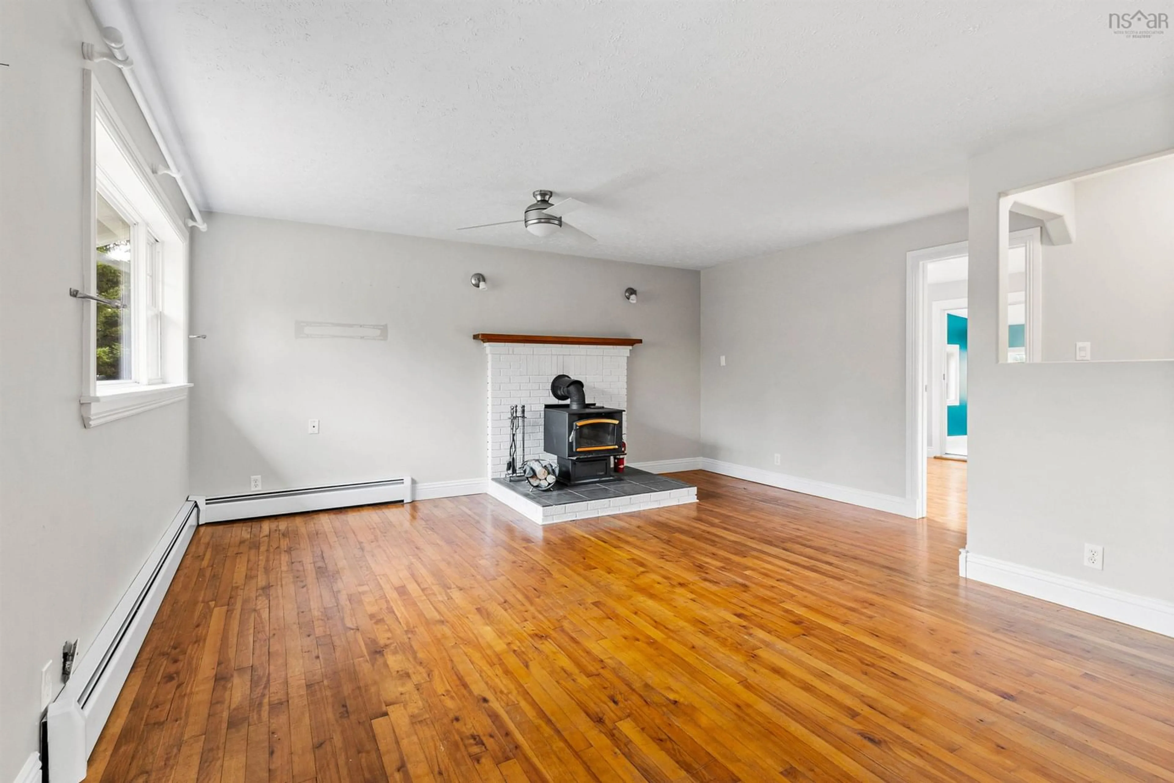 Living room, wood floors for 259 Masons Point Rd, Head Of St. Margarets Bay Nova Scotia B3Z 1Z1