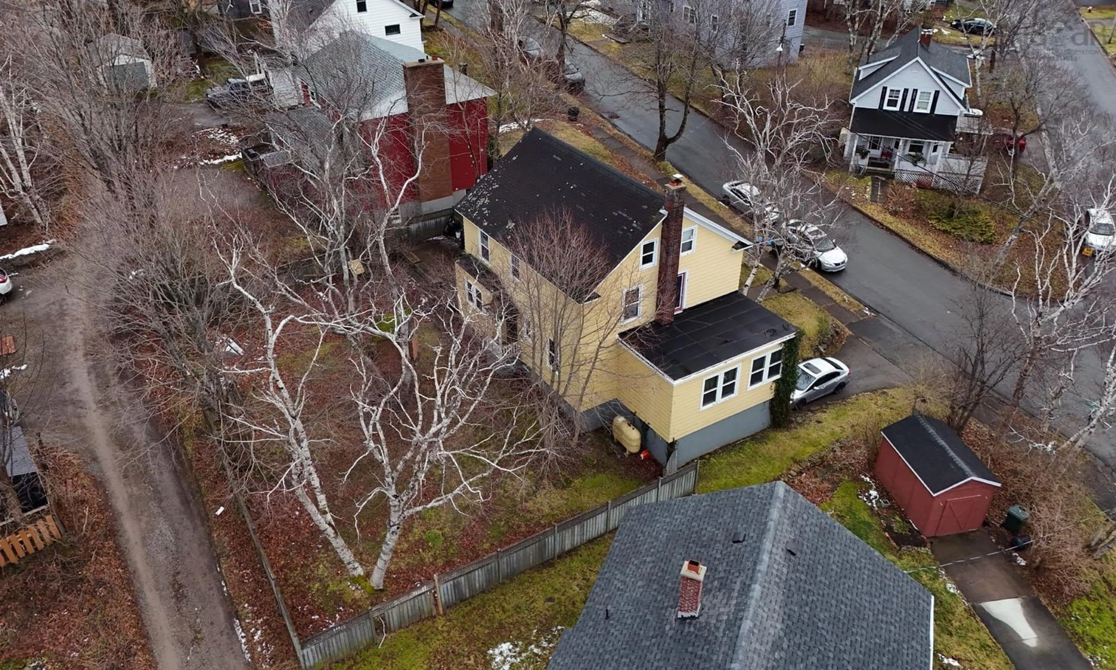 A pic from outside/outdoor area/front of a property/back of a property/a pic from drone, unknown for 201 South Bentinck St, Sydney Nova Scotia B1P 1X7