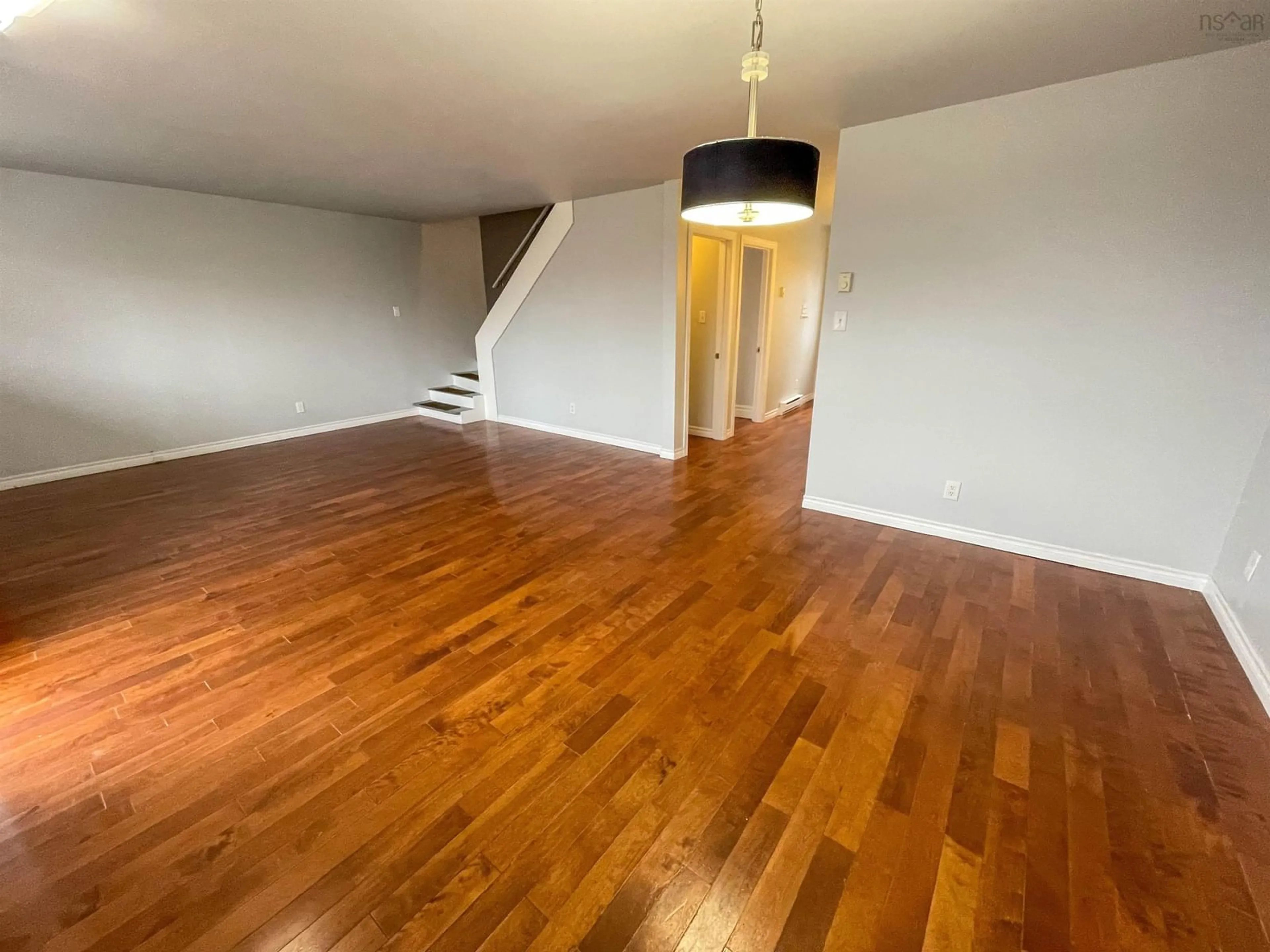 A pic of a room, wood floors for 58 Common St, Sydney Nova Scotia B1P 6M5