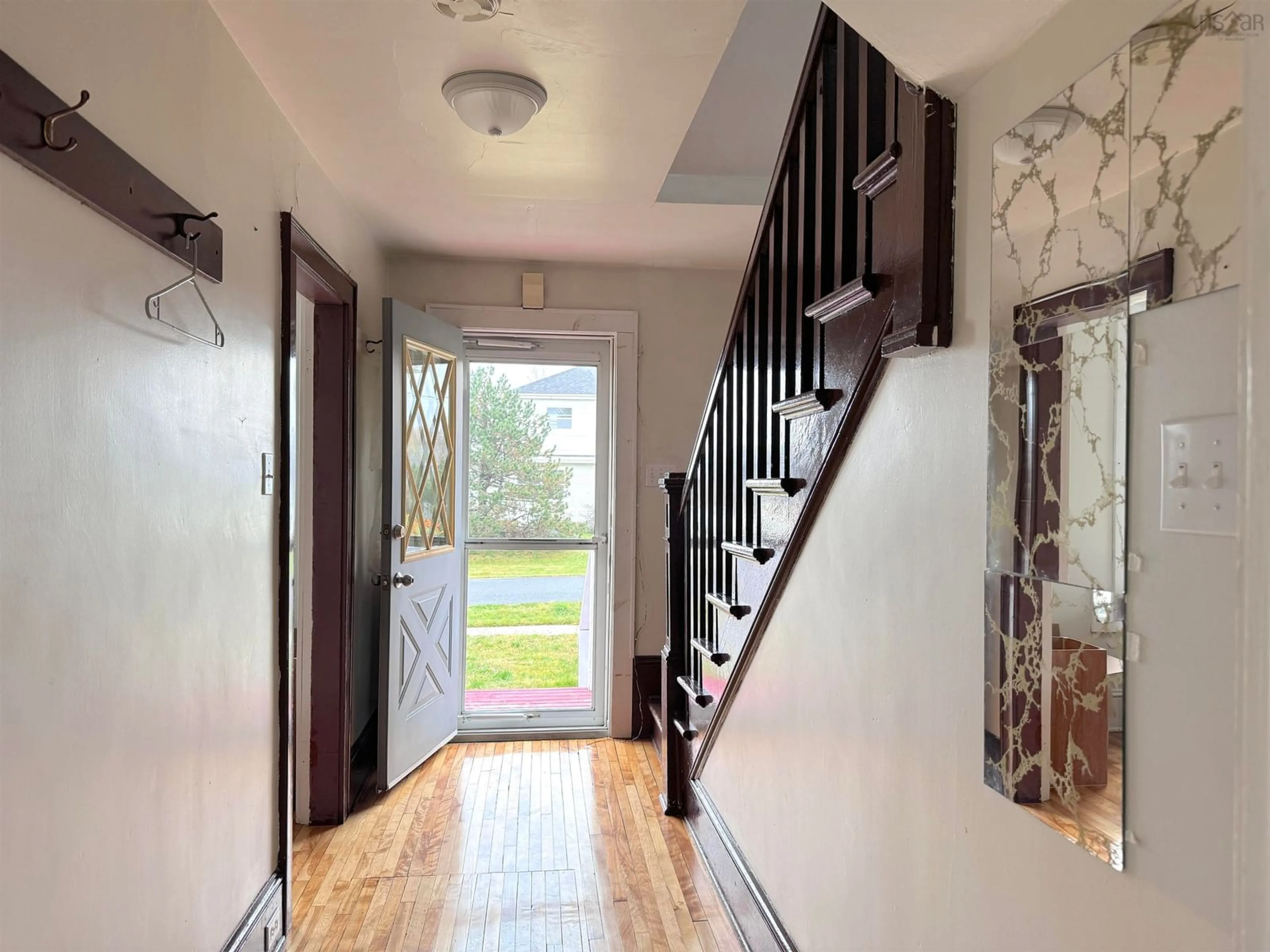 Indoor entryway, wood floors for 16 George St, Glace Bay Nova Scotia B1A 1A9