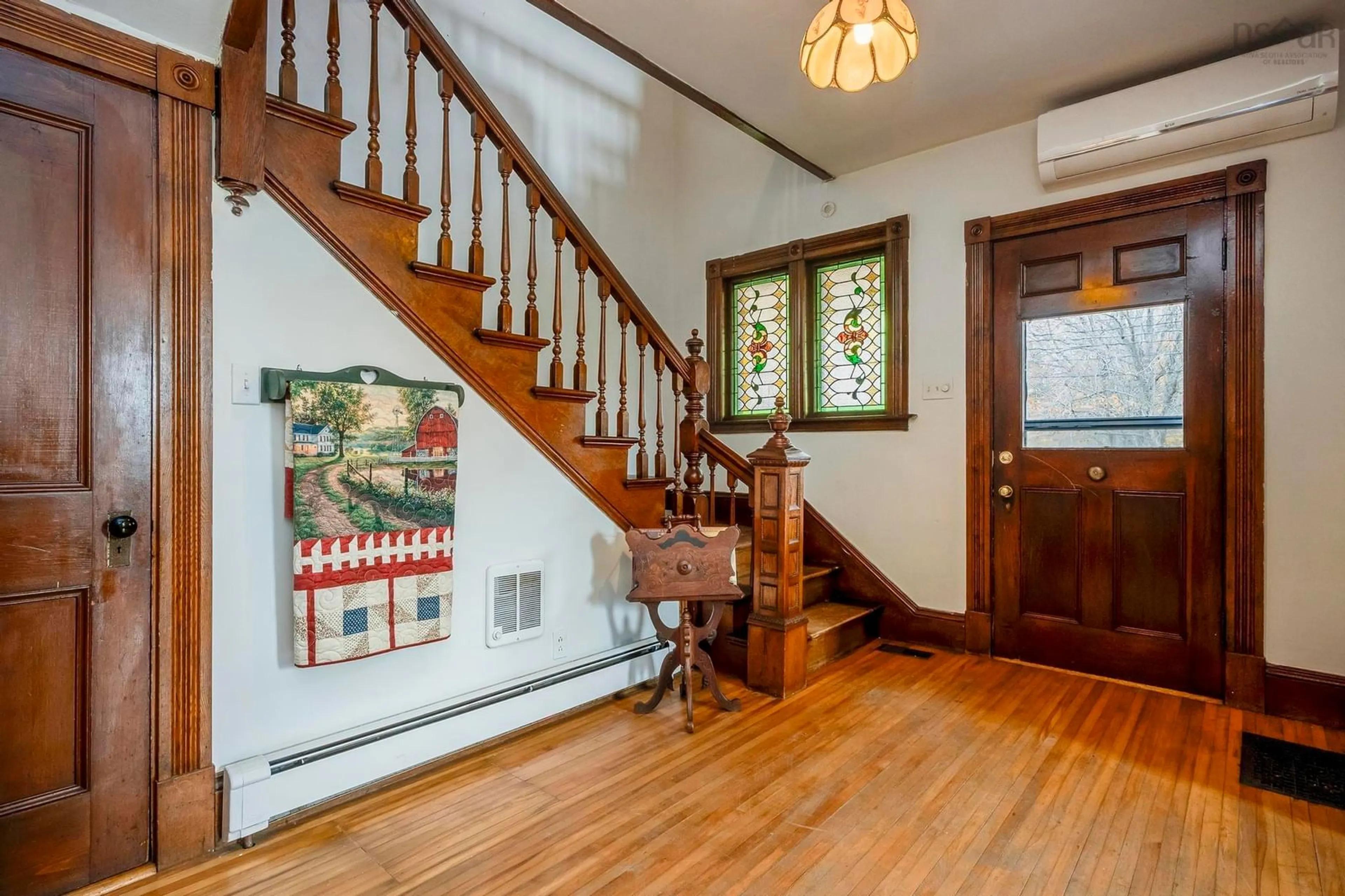 Indoor foyer, wood floors for 10251 1 Hwy, Paradise Nova Scotia B0S 1C0