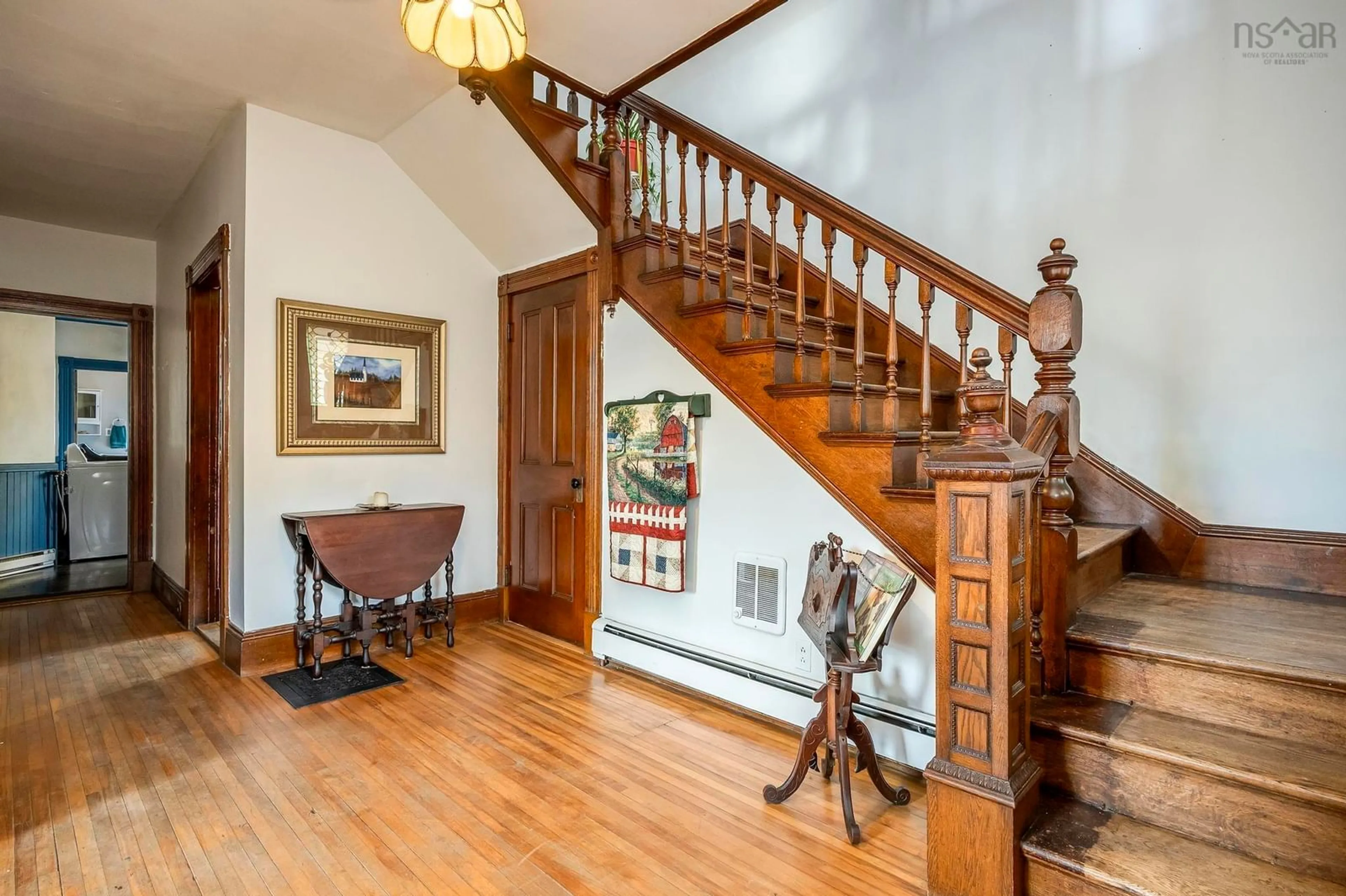 Indoor foyer, wood floors for 10251 1 Hwy, Paradise Nova Scotia B0S 1C0