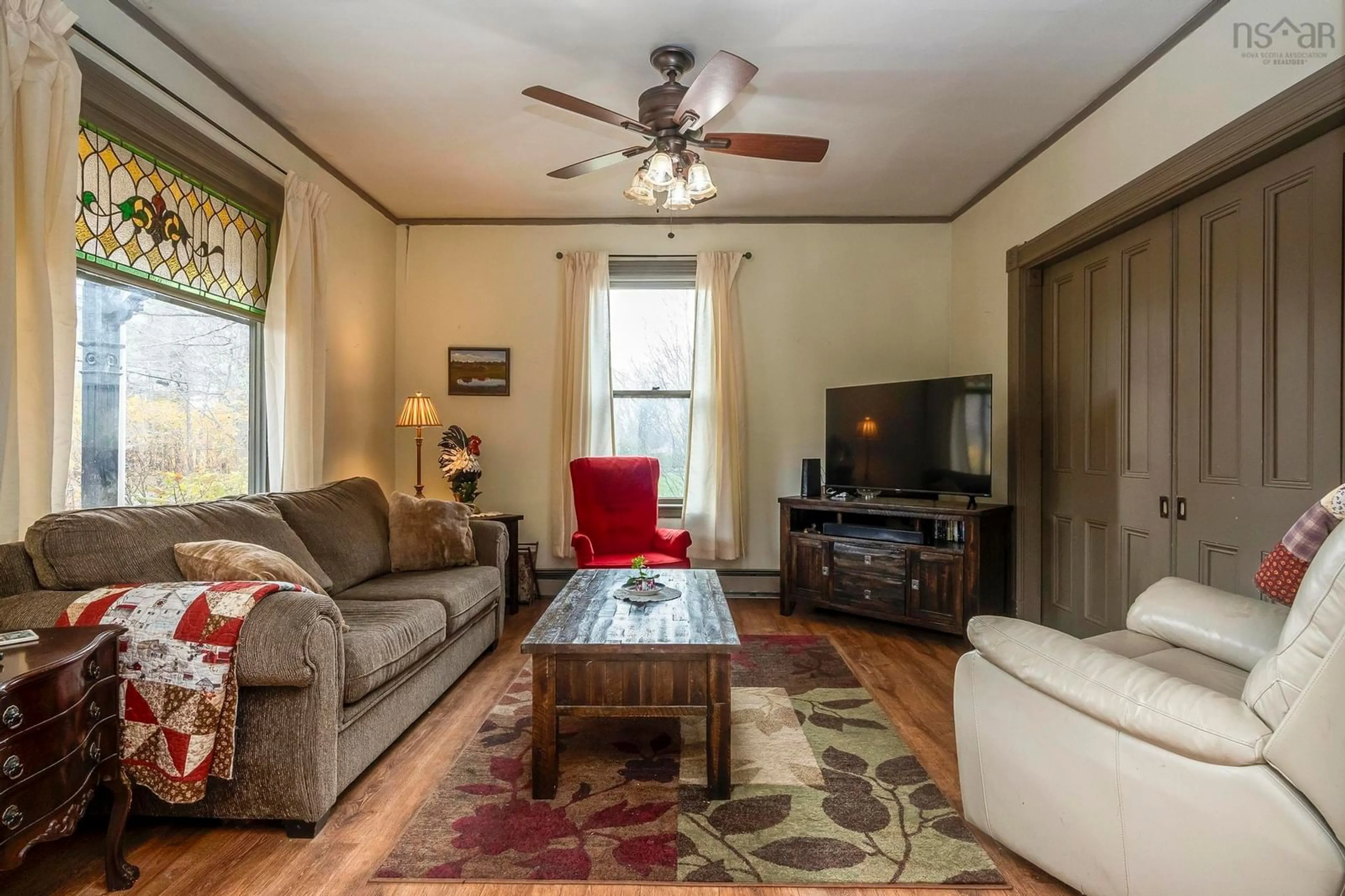 Living room, wood floors for 10251 1 Hwy, Paradise Nova Scotia B0S 1C0