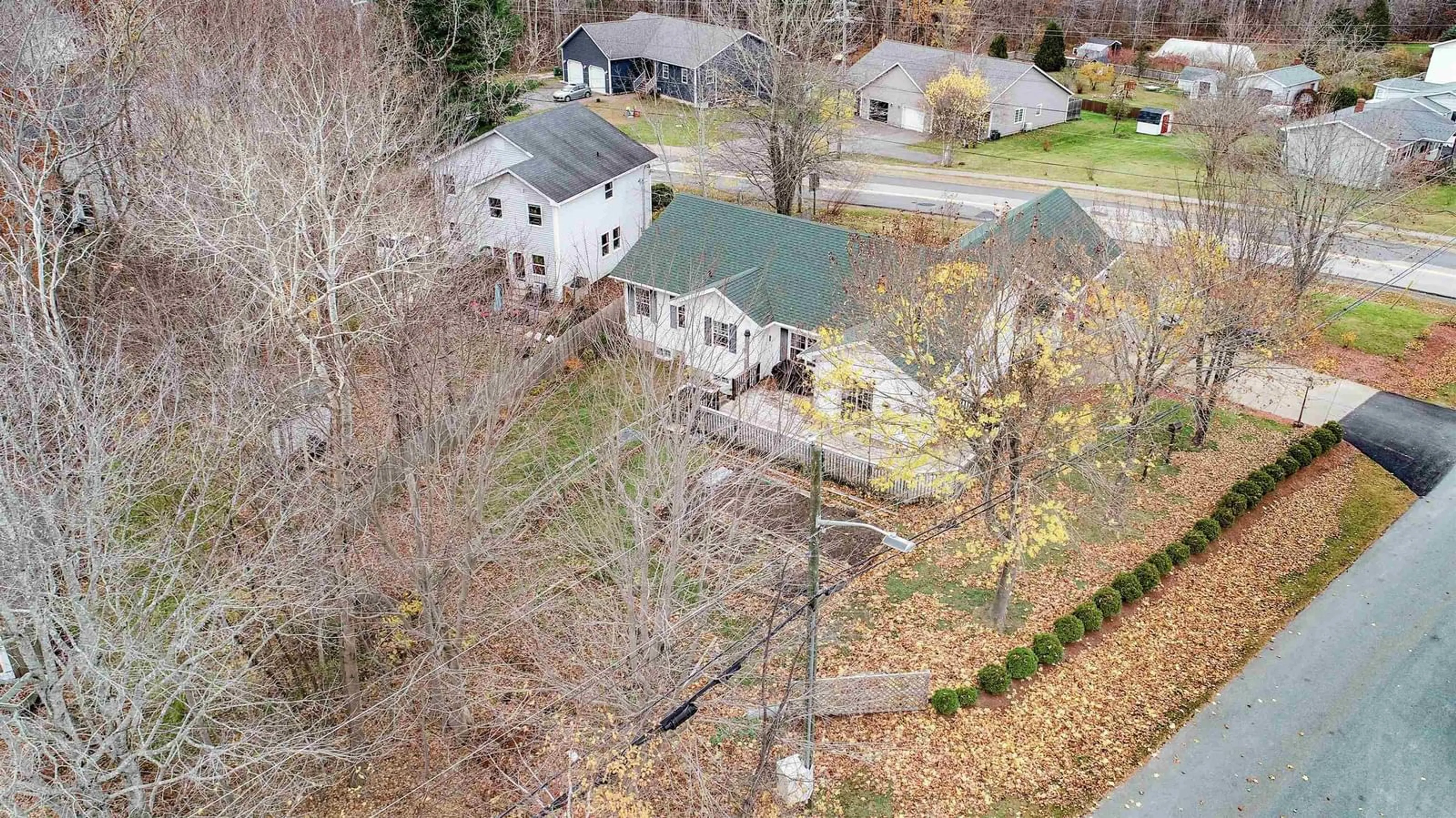 Frontside or backside of a home, the fenced backyard for 163 Orchard St, Berwick Nova Scotia B0P 1E0