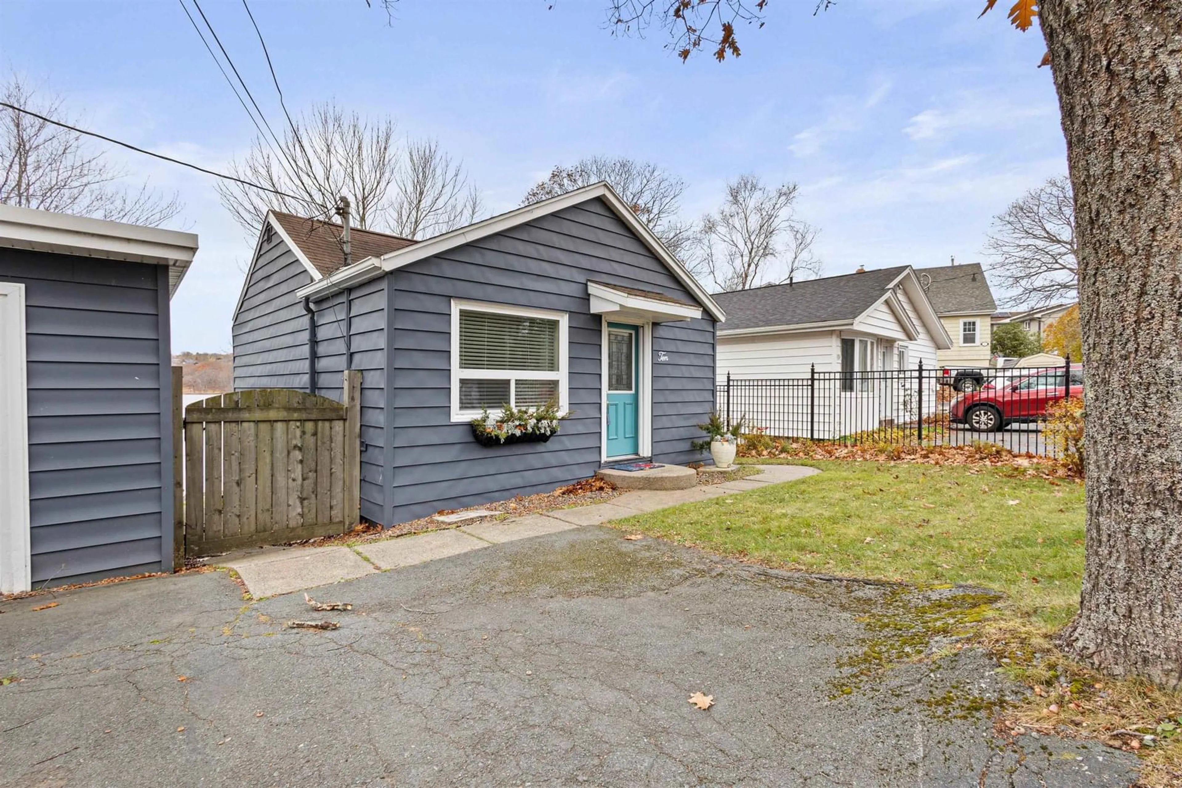 Frontside or backside of a home, the fenced backyard for 10 Lakeview Point Rd, Dartmouth Nova Scotia B2Y 3H2