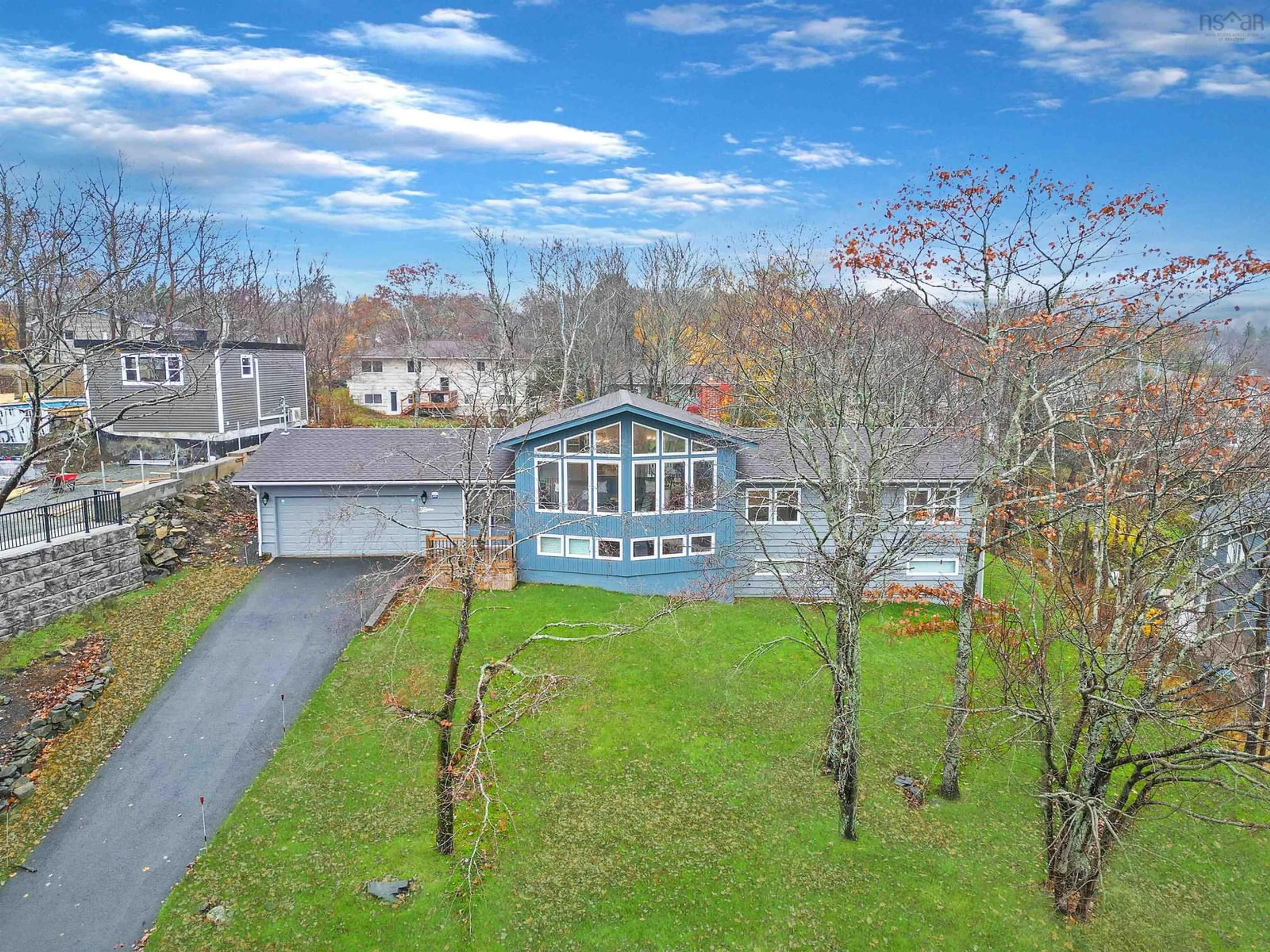 A pic from exterior of the house or condo, the fenced backyard for 38 Broadholme Lane, Halifax Nova Scotia B3M 3C1