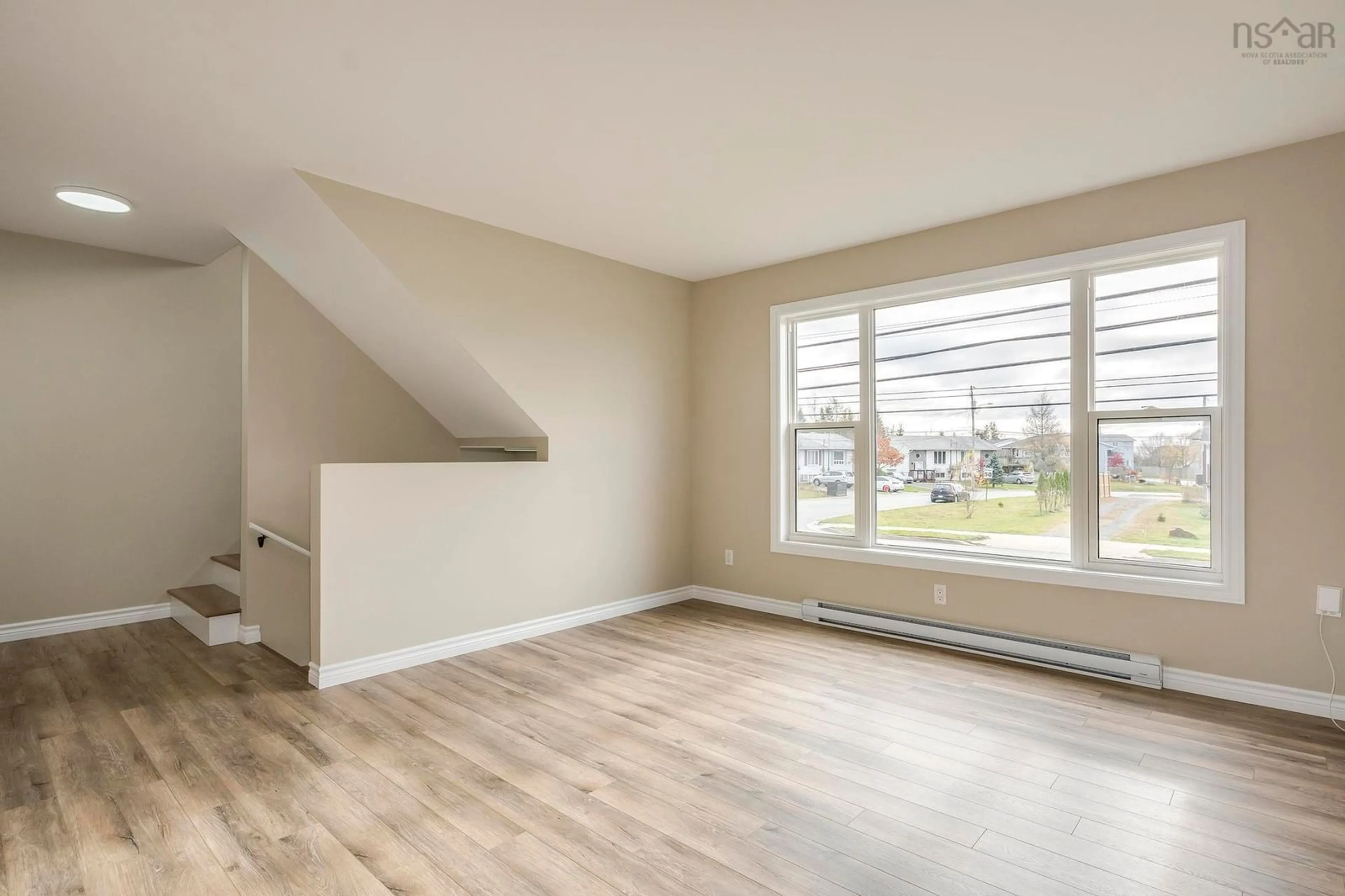 A pic of a room, wood floors for 254 Cow Bay Rd, Eastern Passage Nova Scotia B3G 1C4