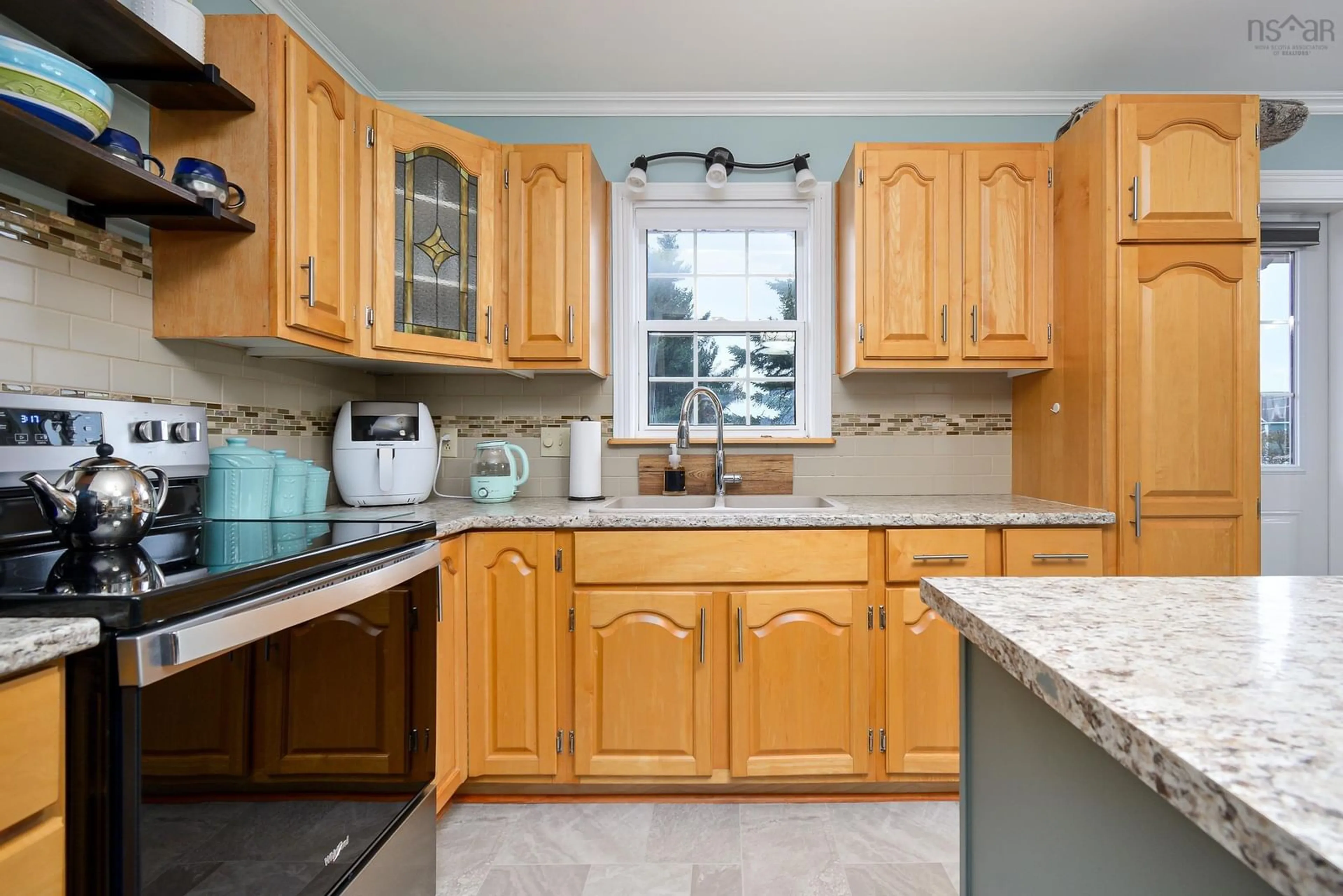 Standard kitchen, wood floors, cottage for 16 Macneils Lane, New Waterford Nova Scotia B1H 2T5