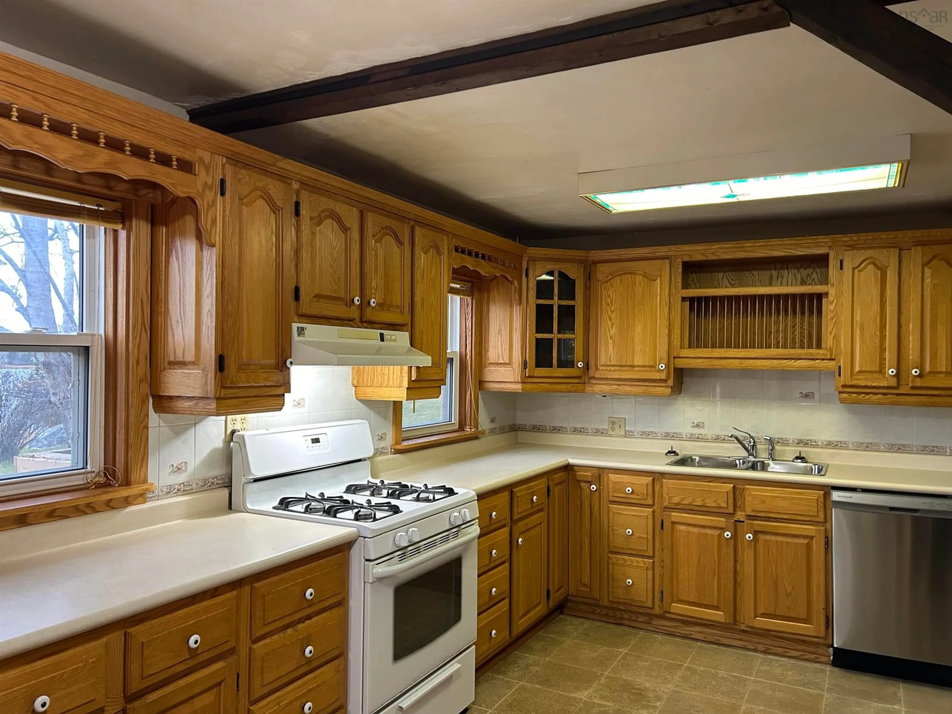 Standard kitchen, wood floors, cottage for 142 Bay Side Dr, Brass Hill Nova Scotia B0W 1E0